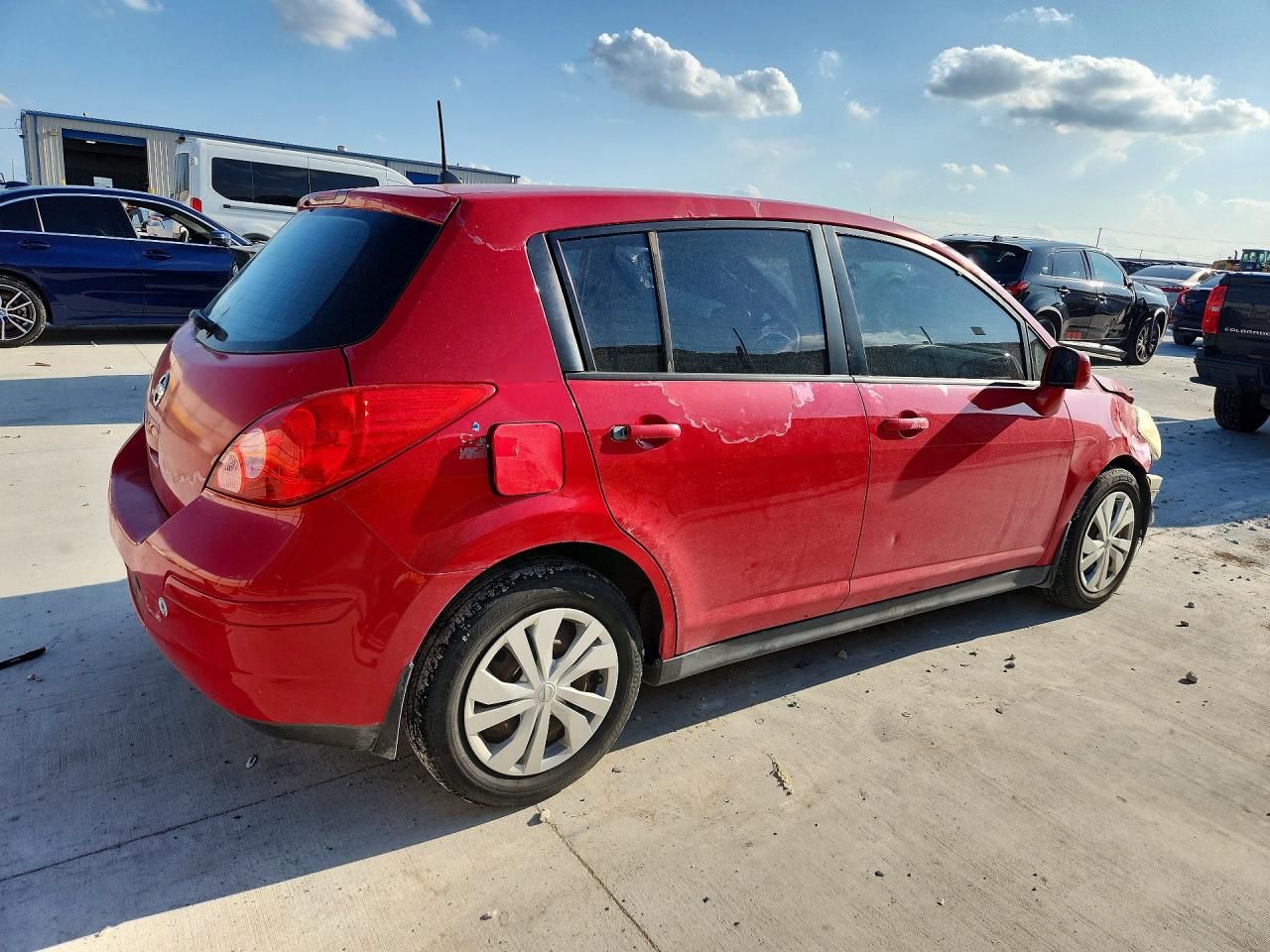 2009 Nissan Versa 1.8 S Red vin: 3N1BC13EX9L388130