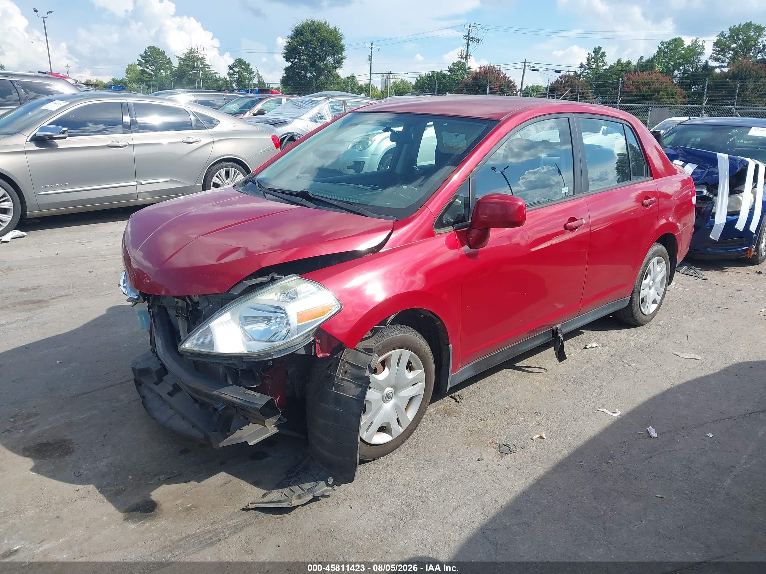 2010 Nissan Versa 1.8s Red vin: 3N1BC1AP9AL378794
