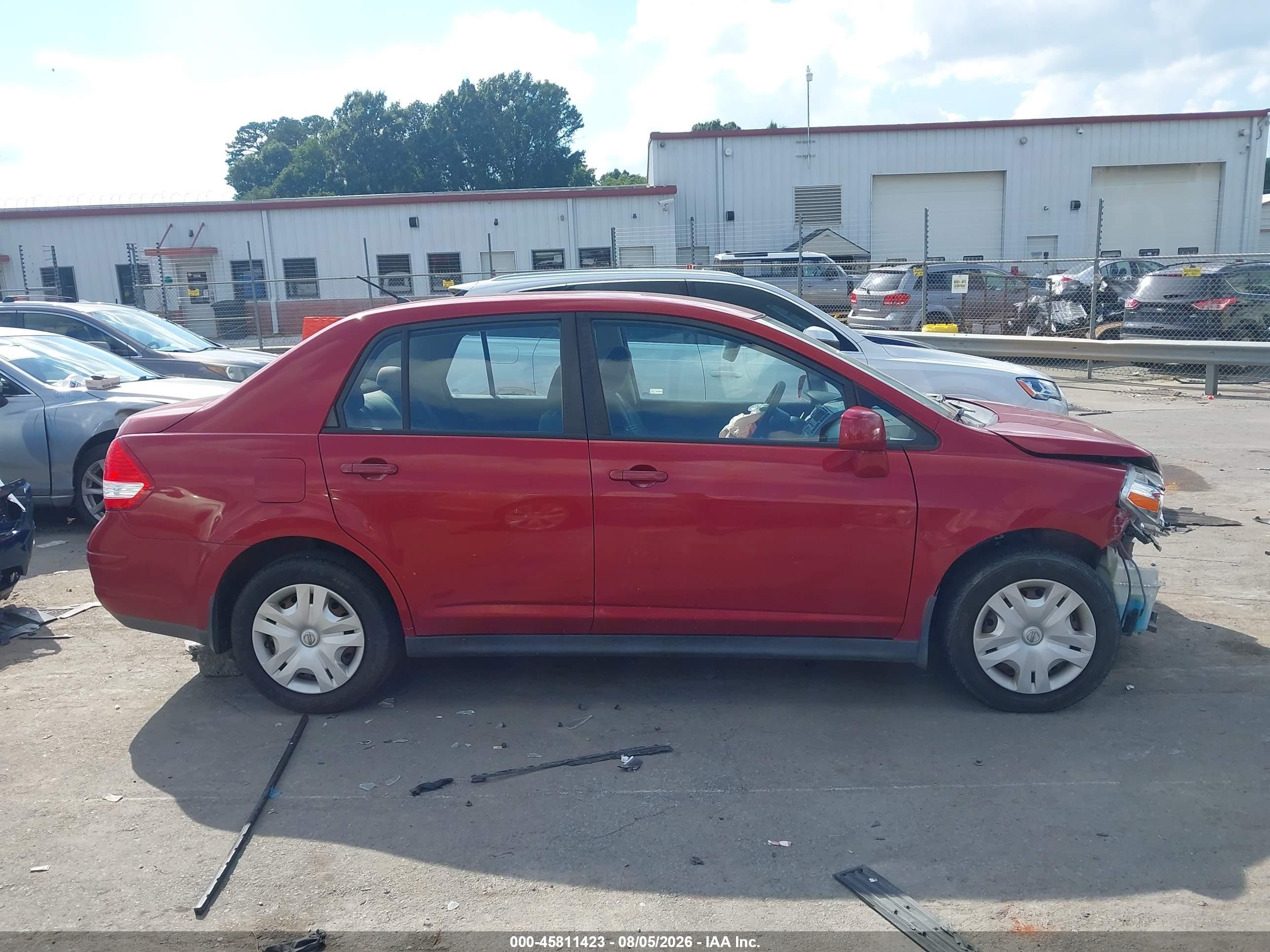 2010 Nissan Versa 1.8s Red vin: 3N1BC1AP9AL378794