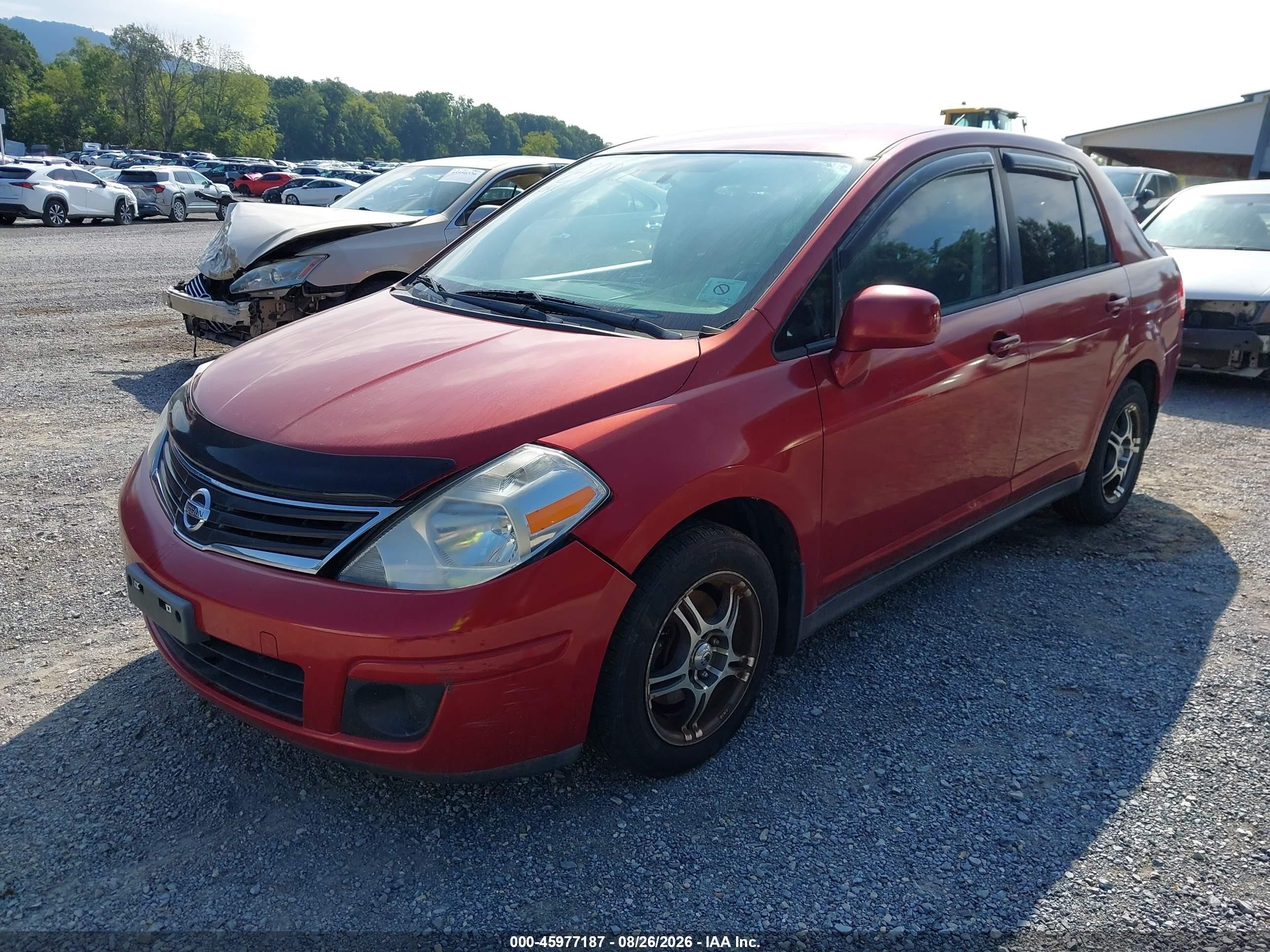 2010 Nissan Versa 1.8s Red vin: 3N1BC1AP9AL440128