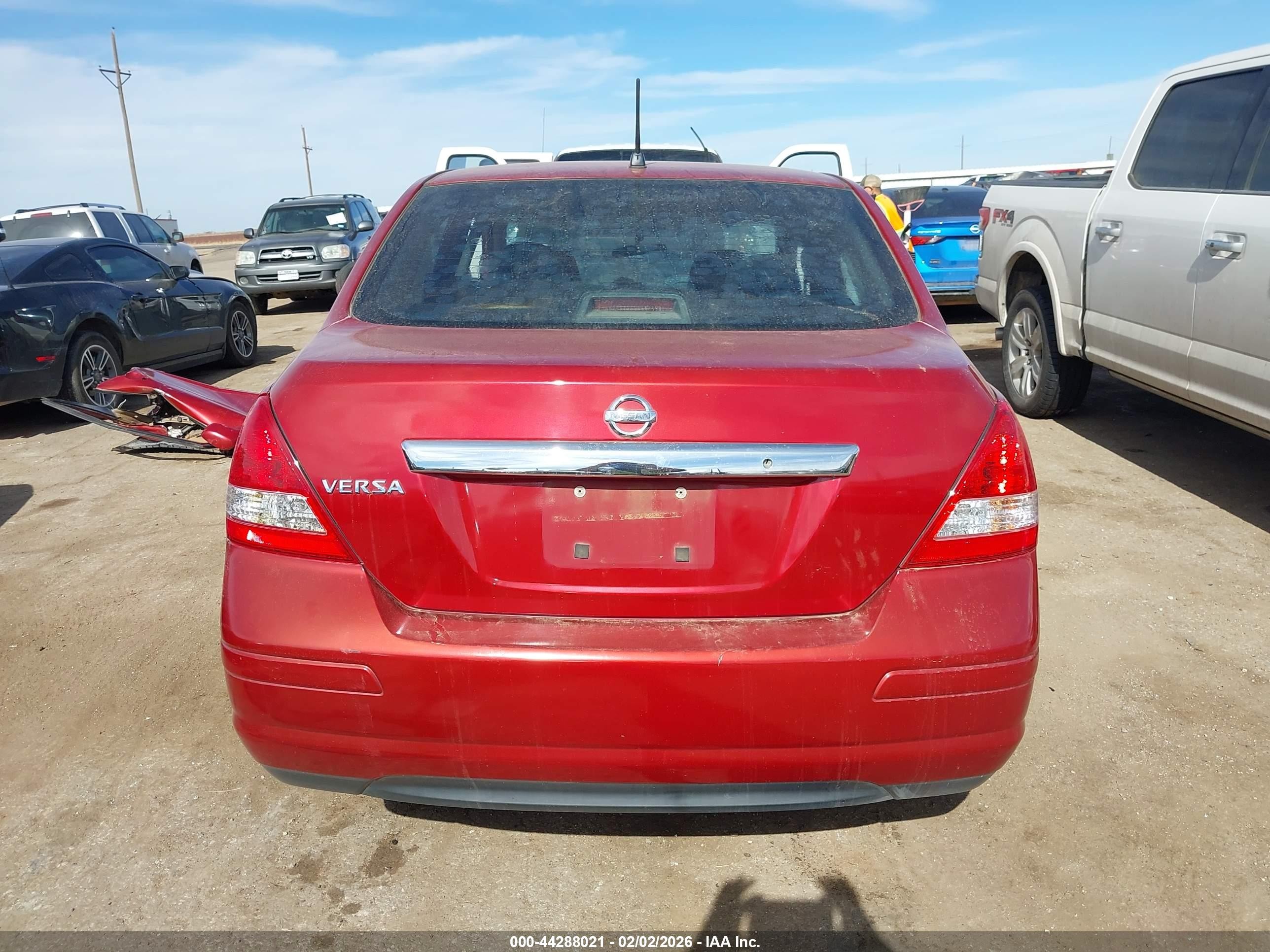 2010 Nissan Versa 1.8s Темно-бордовый vin: 3N1BC1APXAL439439