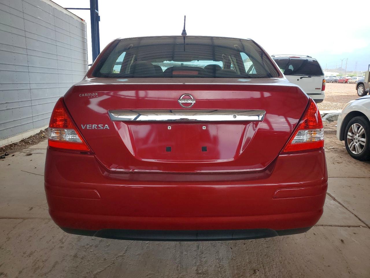 2010 Nissan Versa 1.8 S Red vin: 3N1BC1APXAL463367