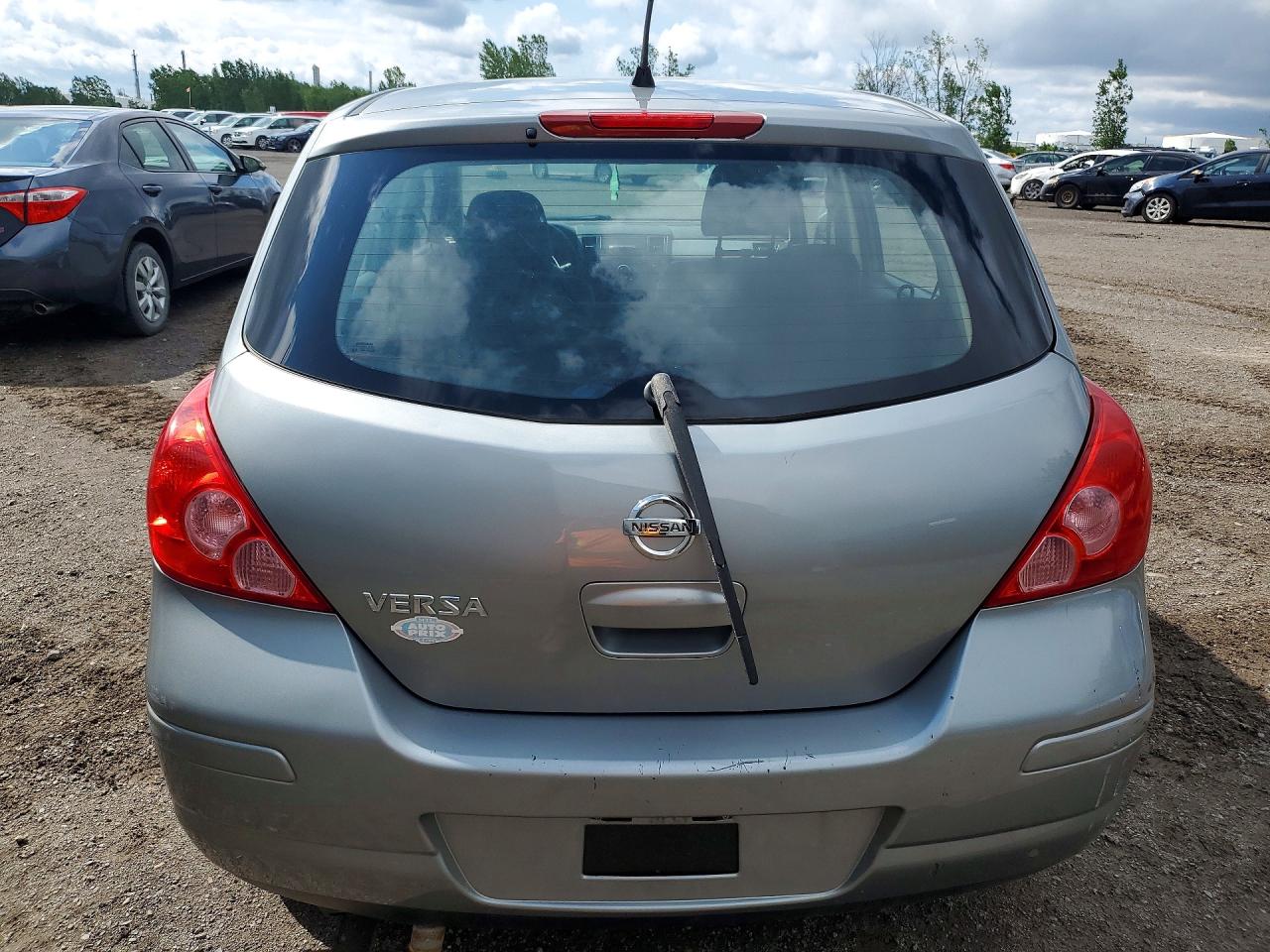 2010 Nissan Versa Silver vin: 3N1BC1CP0AL455453