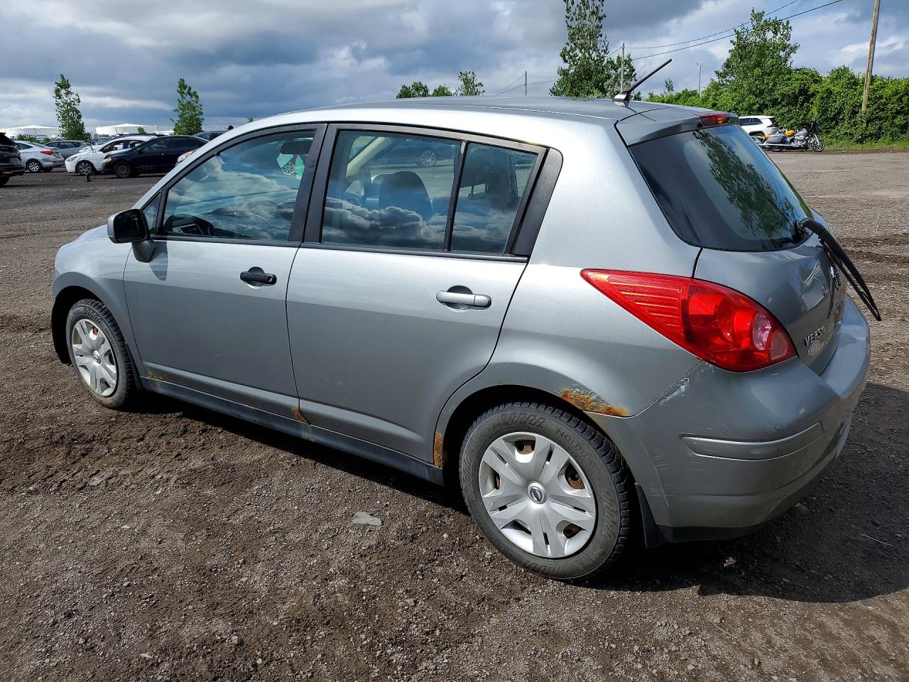 2010 Nissan Versa Silver vin: 3N1BC1CP0AL455453