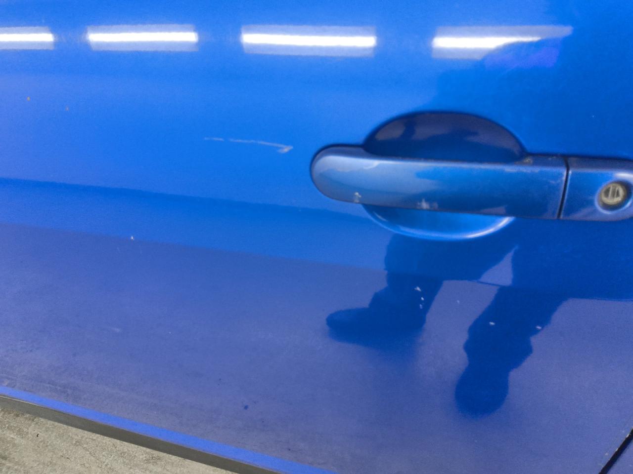 2012 Nissan Versa Blue vin: 3N1BC1CP0CK261174 Damage: Left Front Door, Heavy Scratch, 1 To 2 Inches