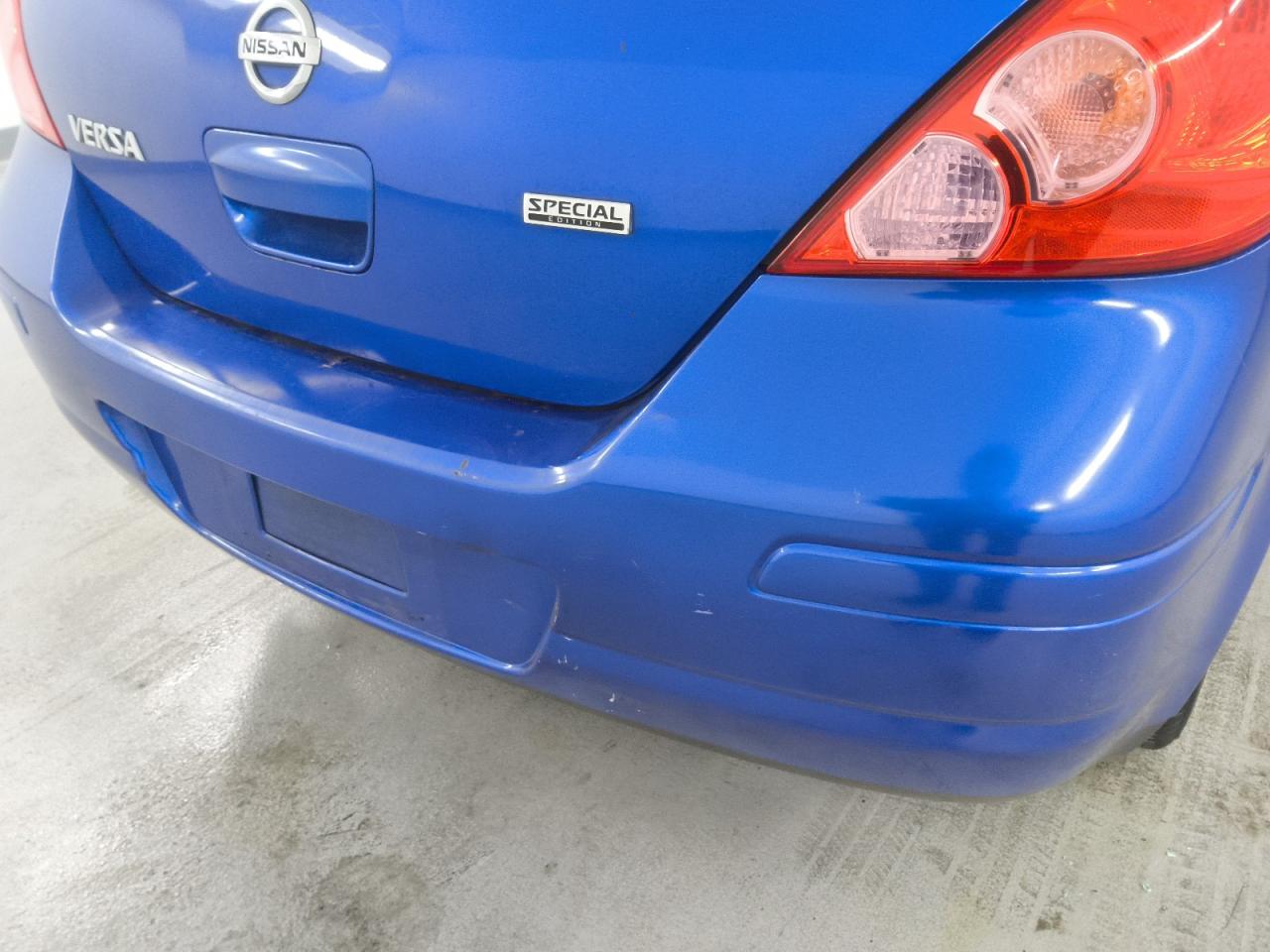 2012 Nissan Versa Blue vin: 3N1BC1CP0CK261174 Damage: Rear Bumper, Previous Repair, Substandard Repair