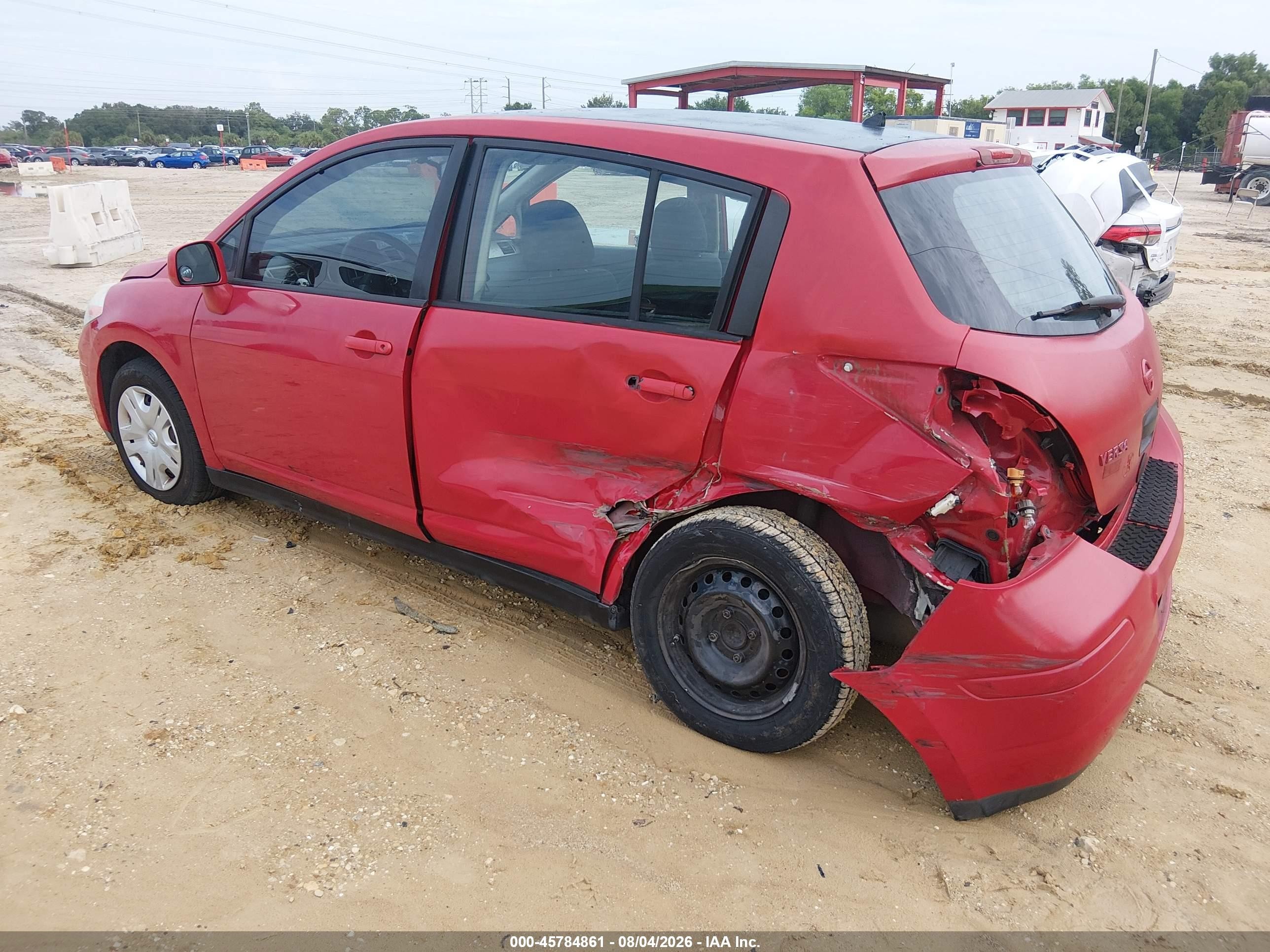 2010 Nissan Versa 1.8s Red vin: 3N1BC1CP1AL458233
