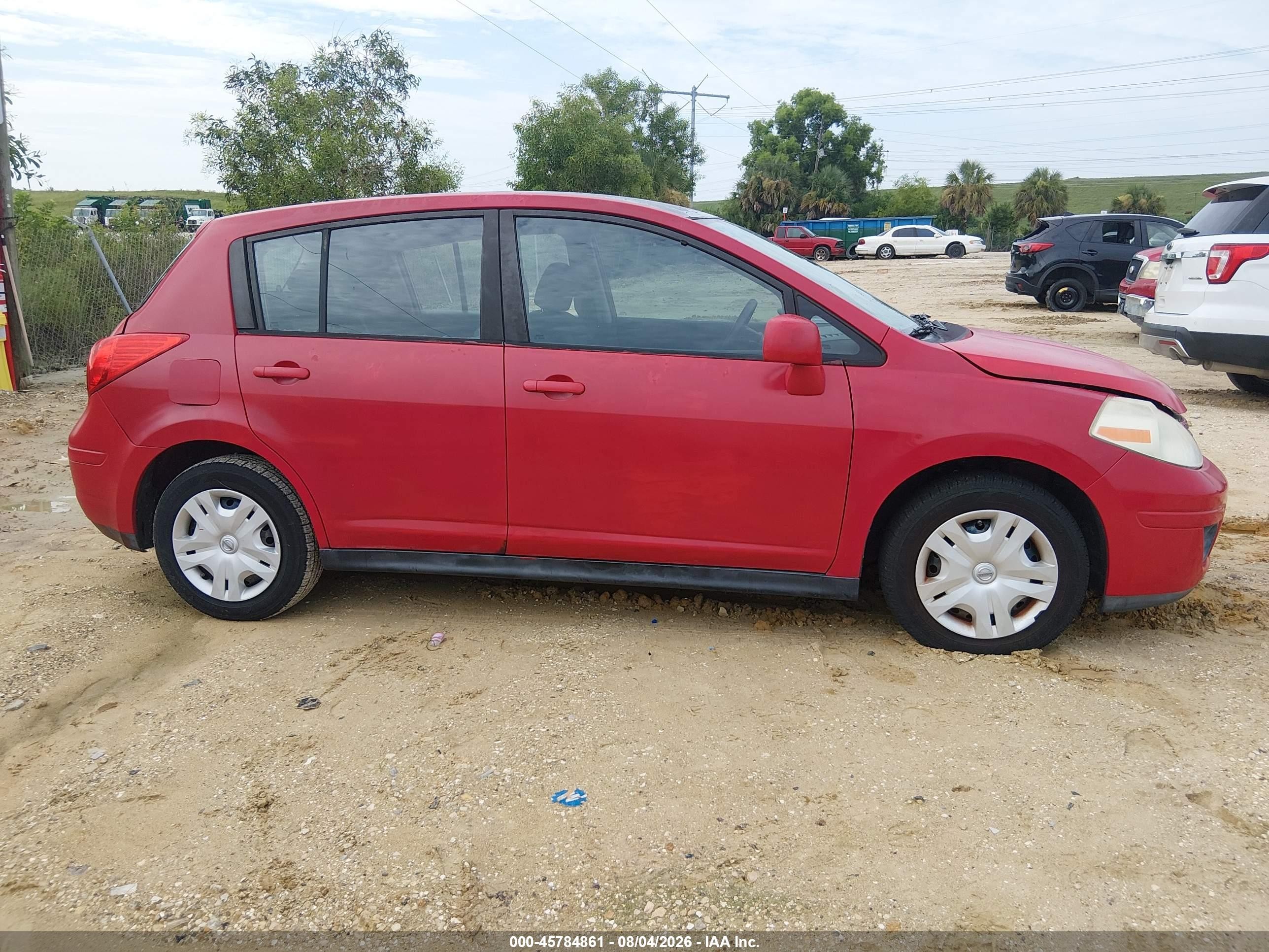 2010 Nissan Versa 1.8s Red vin: 3N1BC1CP1AL458233