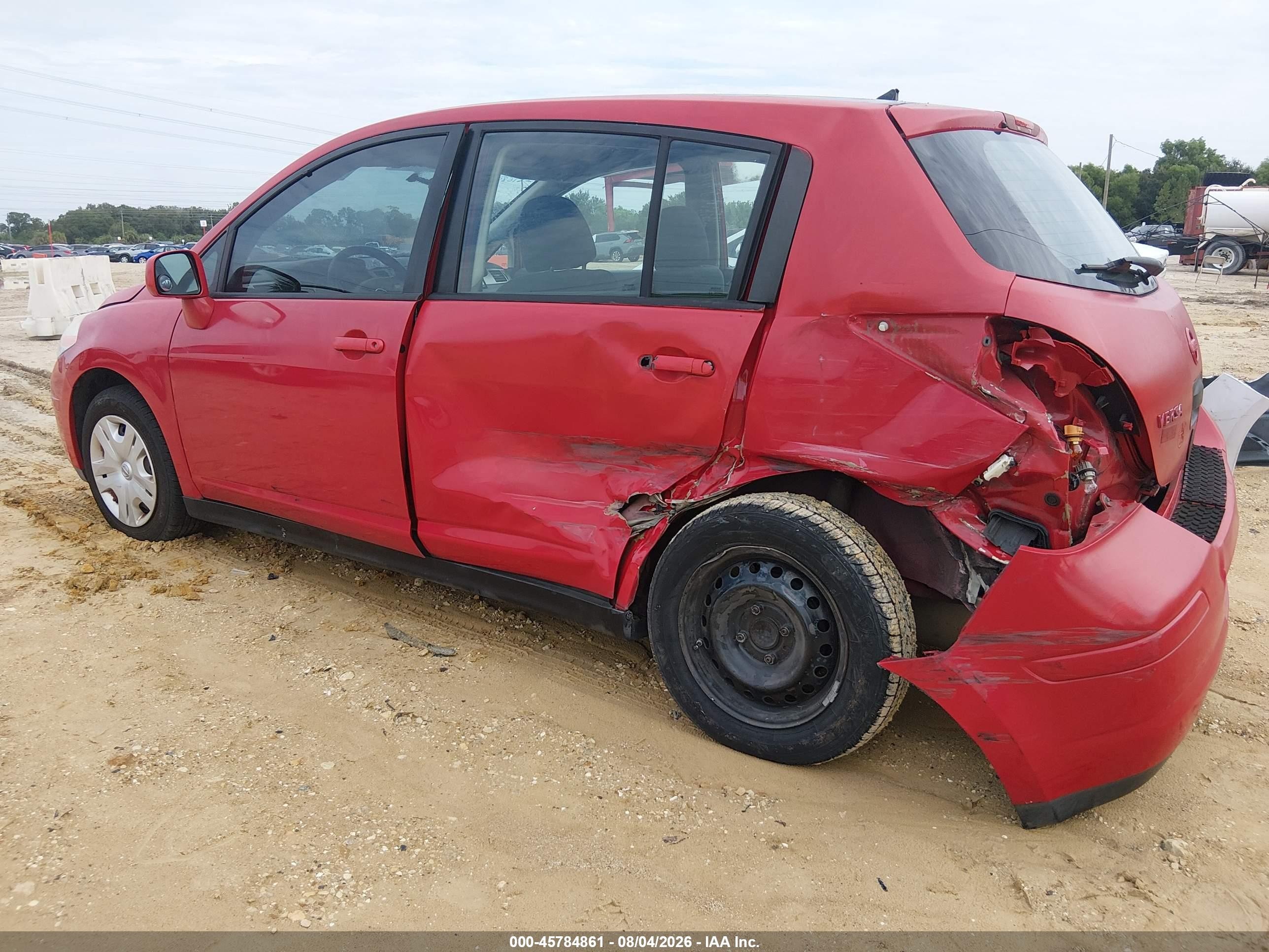 2010 Nissan Versa 1.8s Red vin: 3N1BC1CP1AL458233