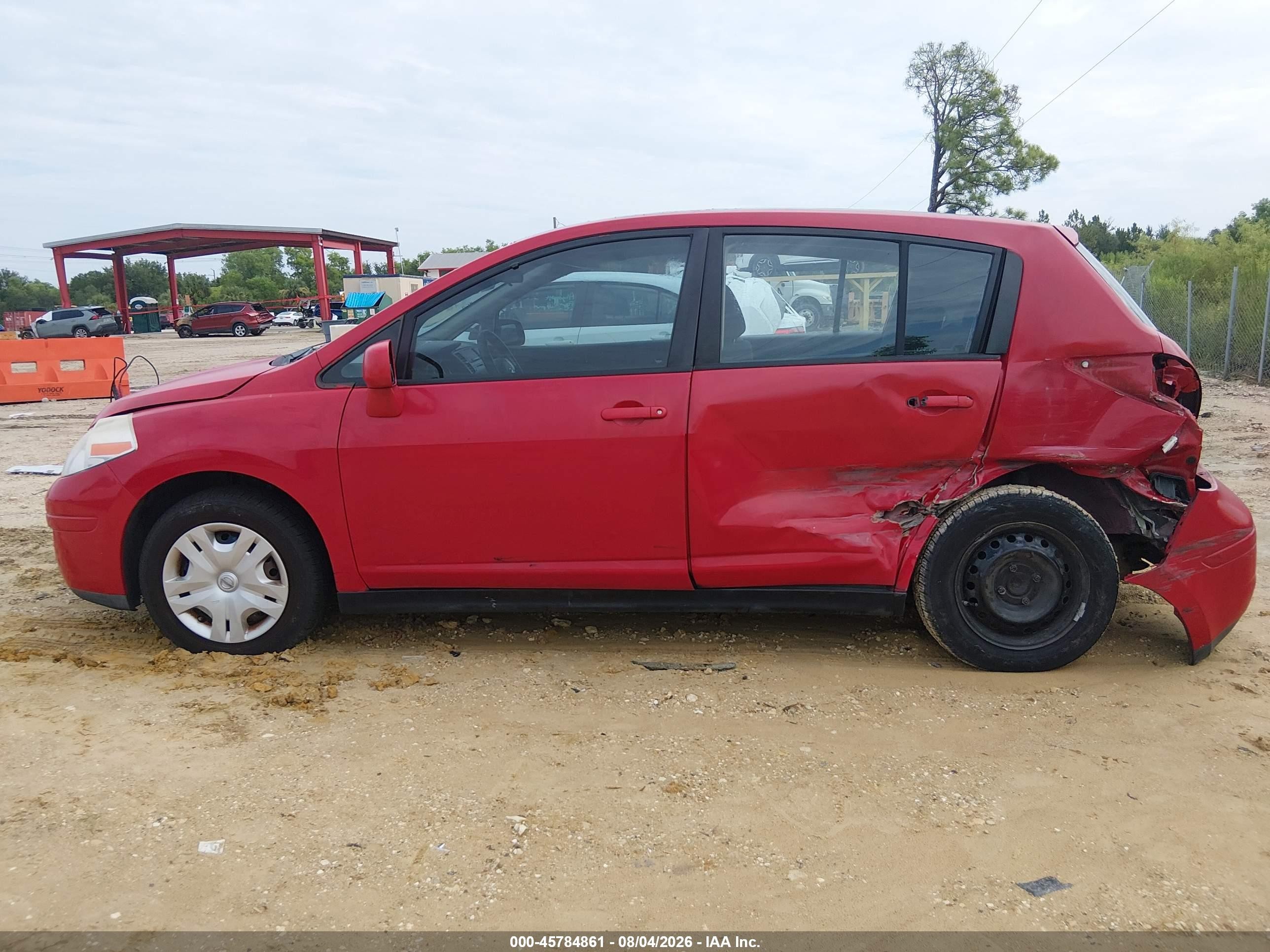 2010 Nissan Versa 1.8s Red vin: 3N1BC1CP1AL458233