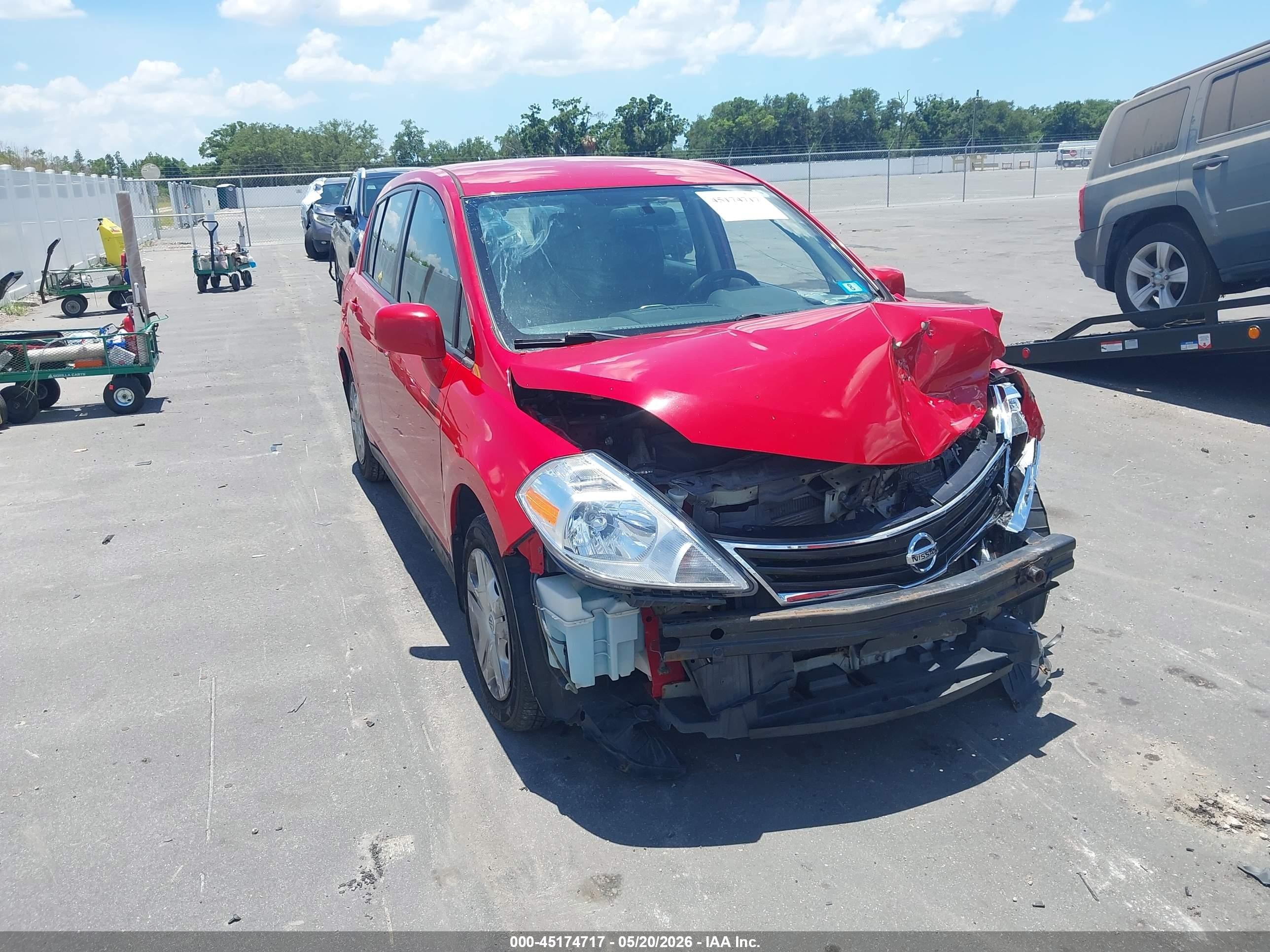 2011 Nissan Versa 1.8s Red vin: 3N1BC1CP1BL447217