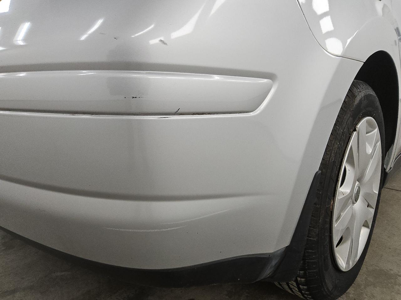 2011 Nissan Versa Silver vin: 3N1BC1CP2BL399839 Damage: Rear Bumper, Multiple Scratches Heavy, 4