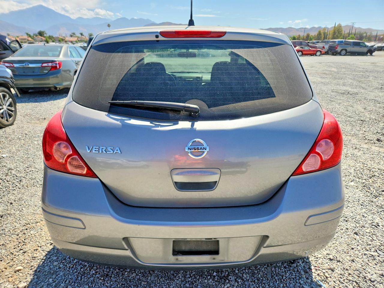 2010 Nissan Versa Hatchback 1.8 S Серый vin: 3N1BC1CP5AL435876