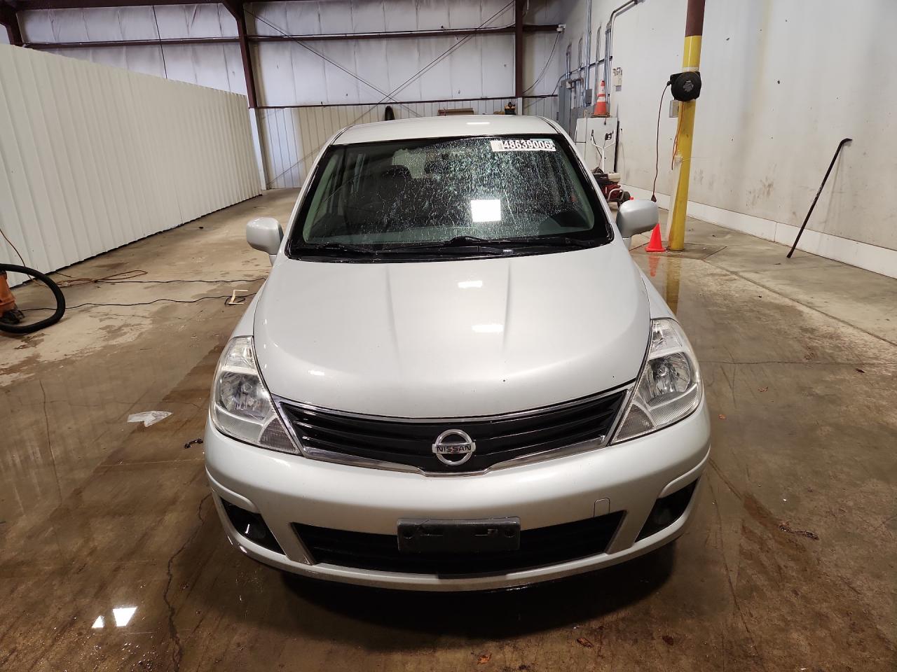 2012 Nissan Versa 1.8 S Silver vin: 3N1BC1CP6CK277301 Damage: Hood, Chipped, 2
