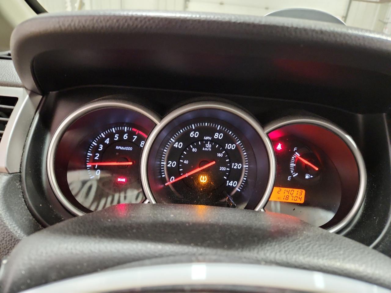 2012 Nissan Versa 1.8 S Silver vin: 3N1BC1CP6CK277301 Damage: Warning - Tire Pressure, On, Unacceptable