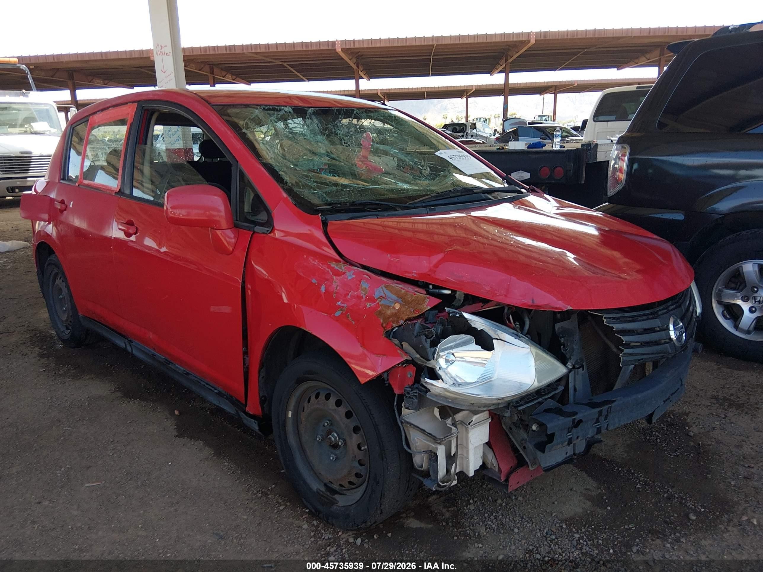 2010 Nissan Versa 1.8s Red vin: 3N1BC1CP7AL455370