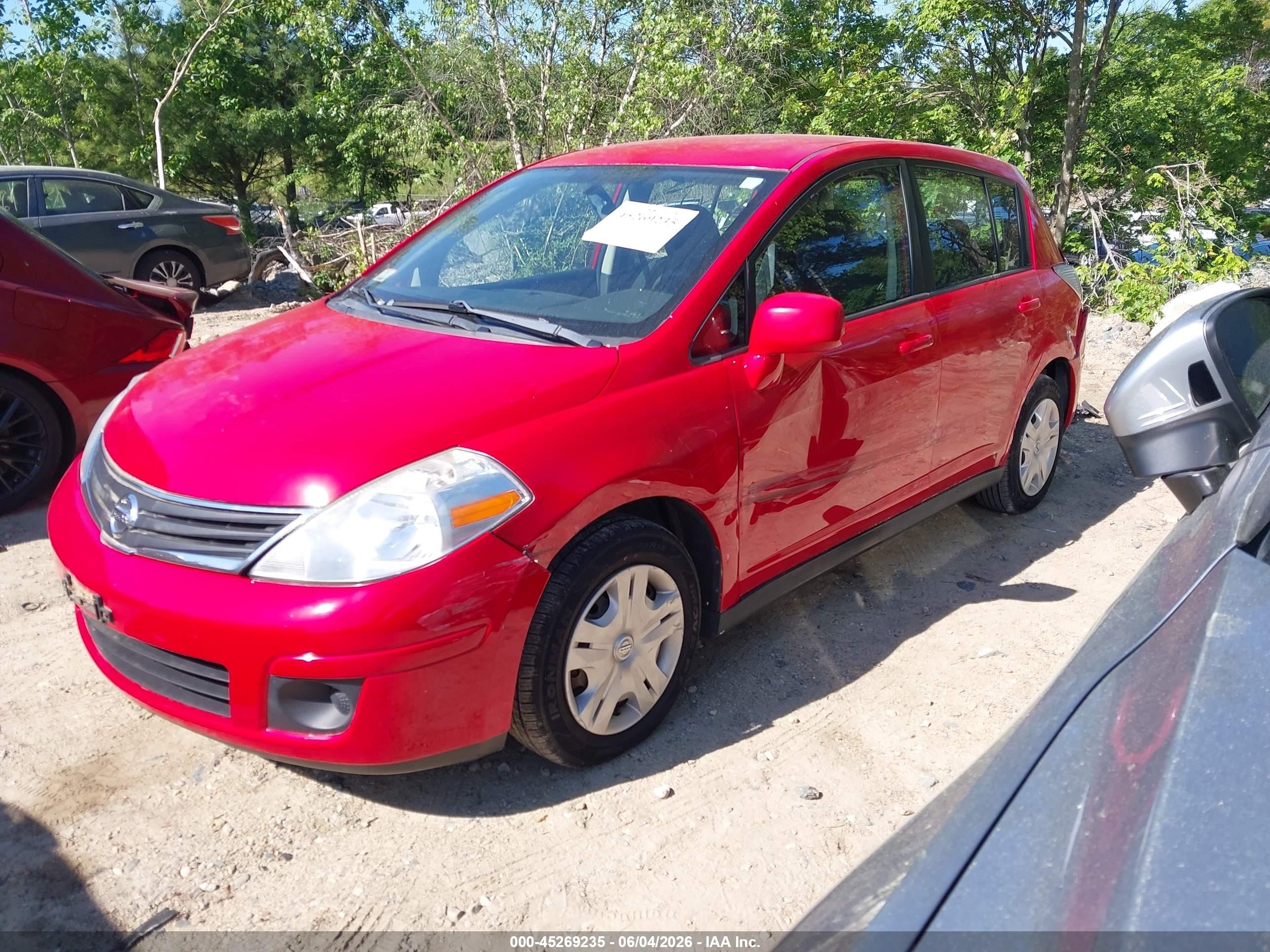 2010 Nissan Versa 1.8s Red vin: 3N1BC1CP8AL416092