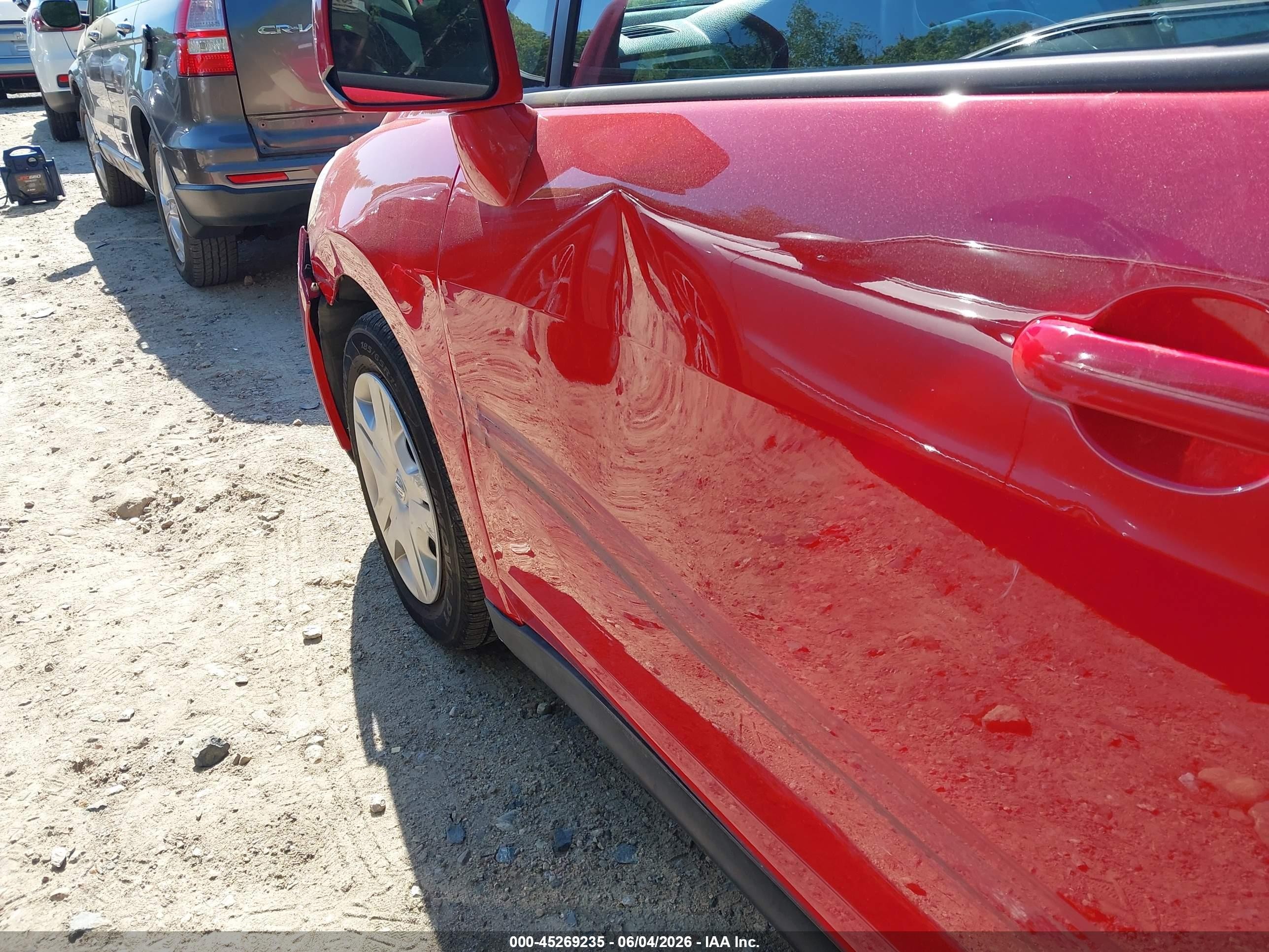 2010 Nissan Versa 1.8s Red vin: 3N1BC1CP8AL416092