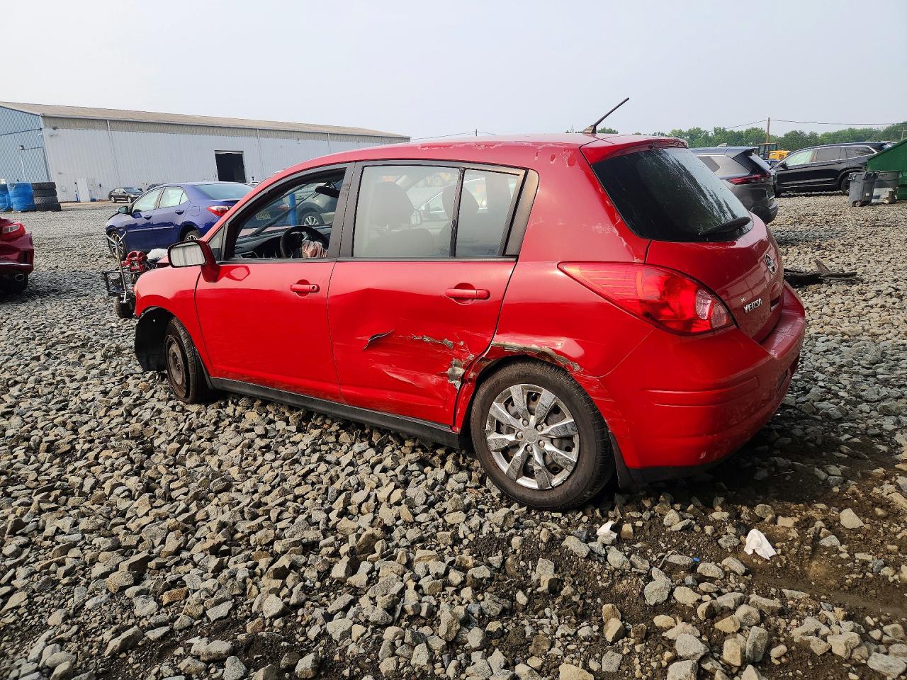 2012 Nissan Versa 1.8 S Red vin: 3N1BC1CP9CK200924