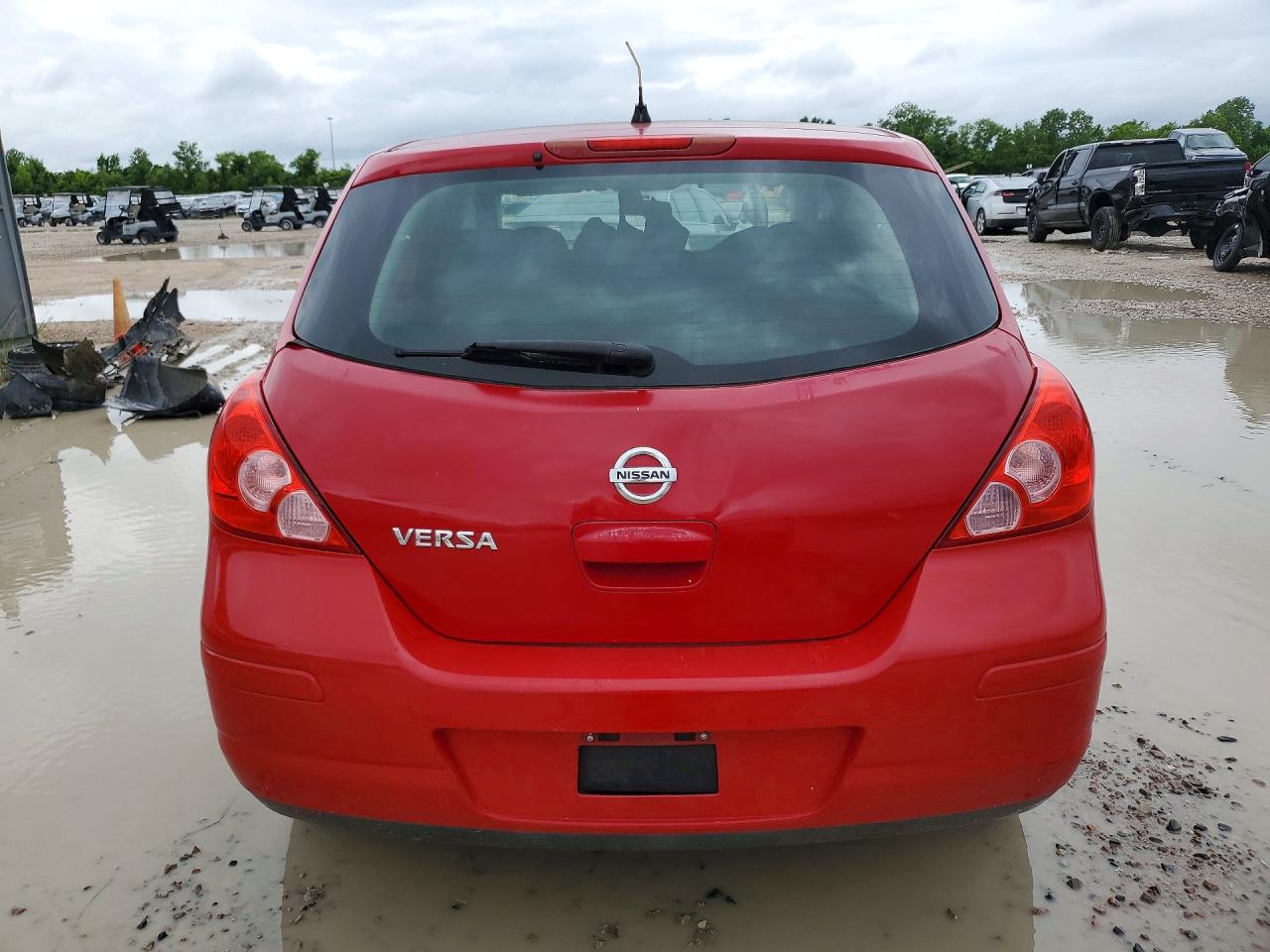 2012 Nissan Versa 1.8 S Red vin: 3N1BC1CP9CK806207