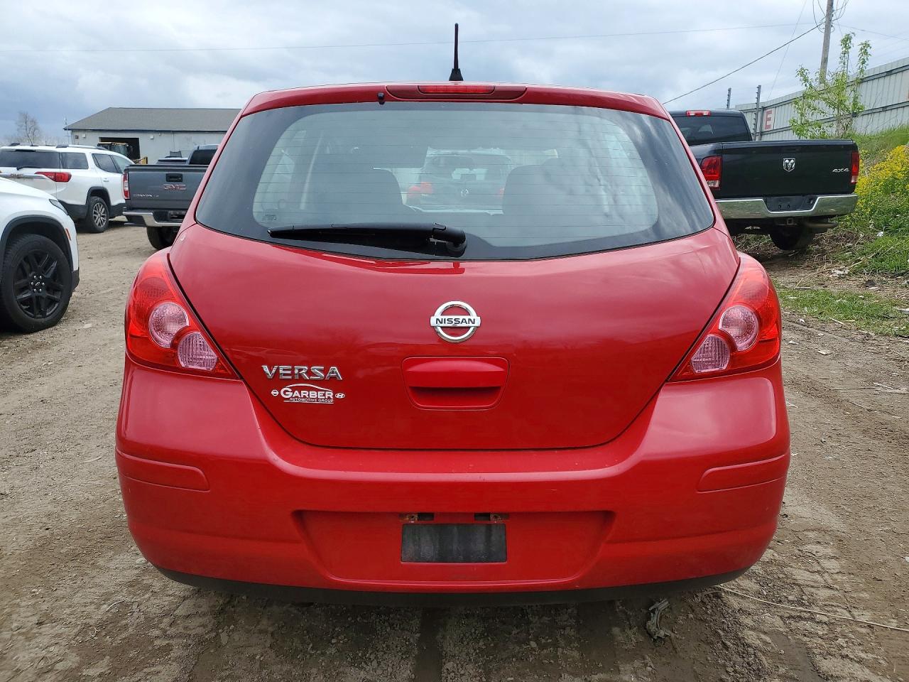 2011 Nissan Versa 1.8 S Red vin: 3N1BC1CPXBL517250