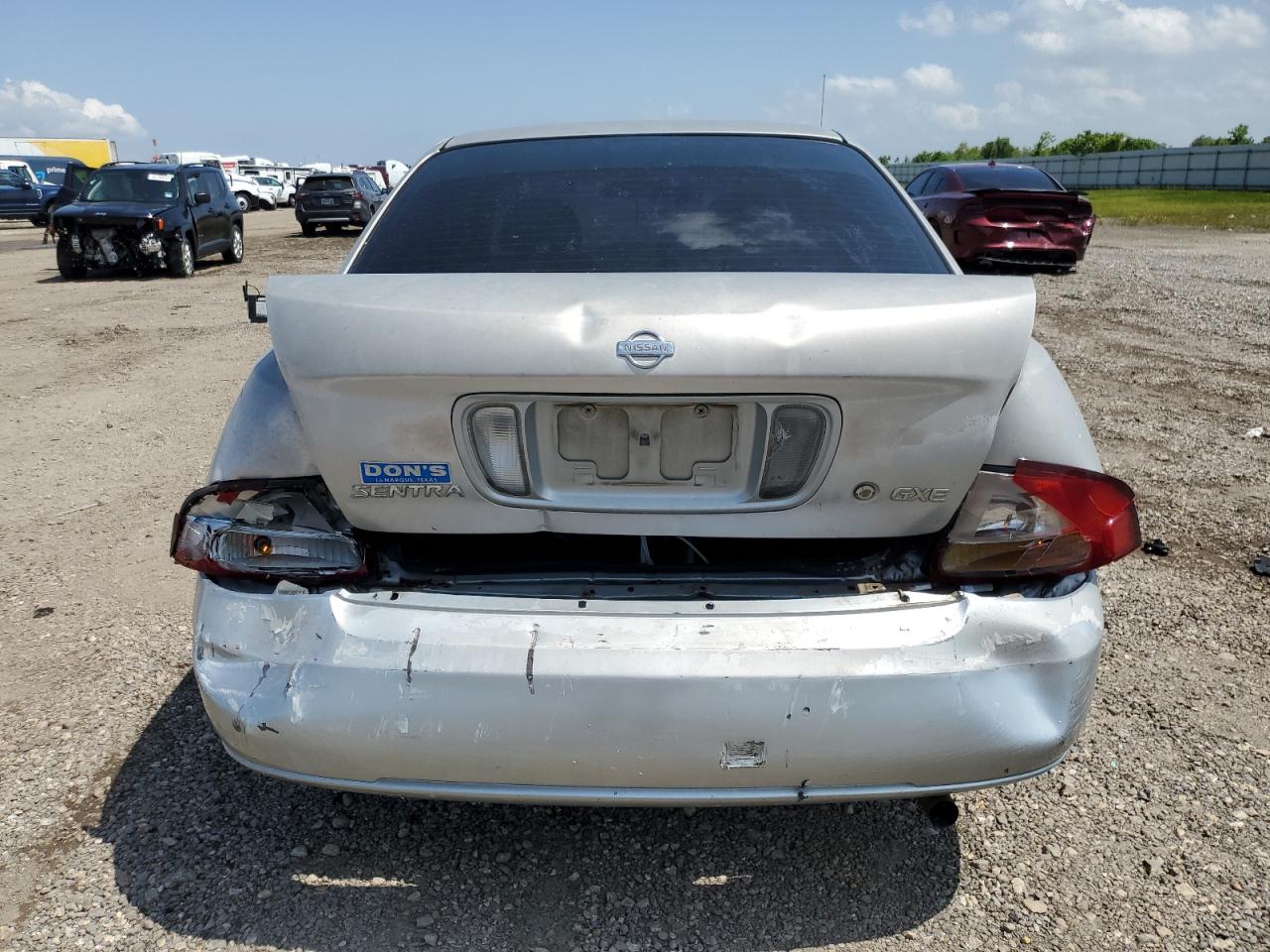 2002 Nissan Sentra Xe Серебряный vin: 3N1CB51D02L588786