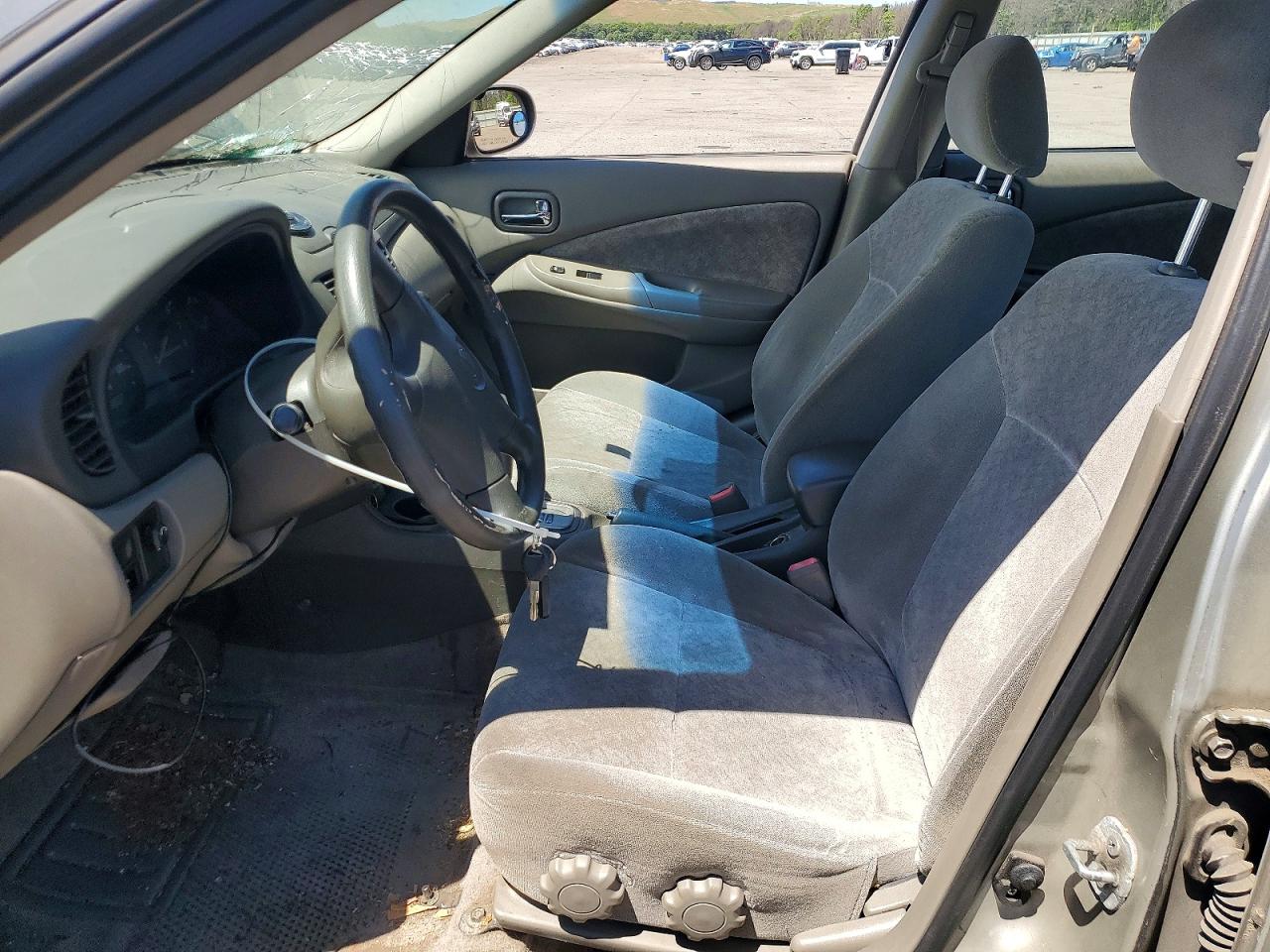 2002 Niss Sentra Beige vin: 3N1CB51D02L686457