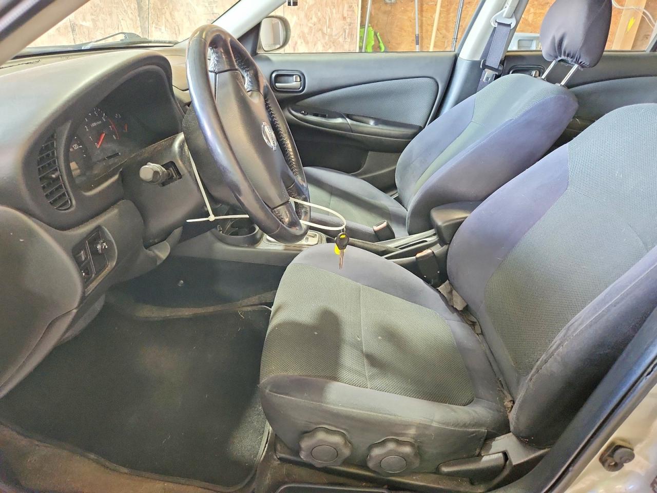 2005 Nissan Sentra 1.8 Tan vin: 3N1CB51D05L545800