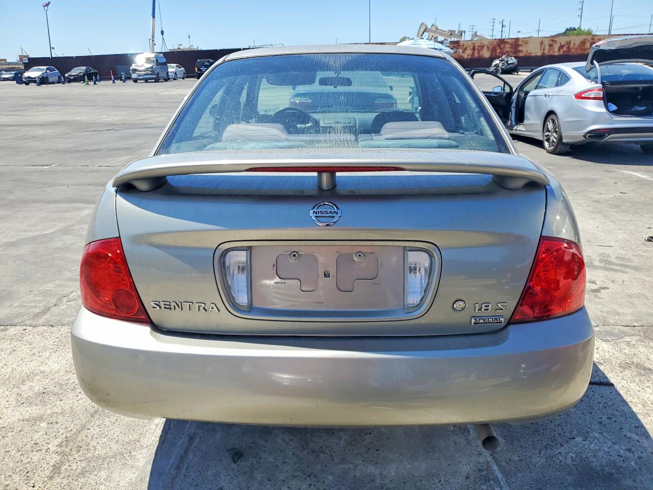 2006 Nissan Sentra 1.8 Tan vin: 3N1CB51D26L465979