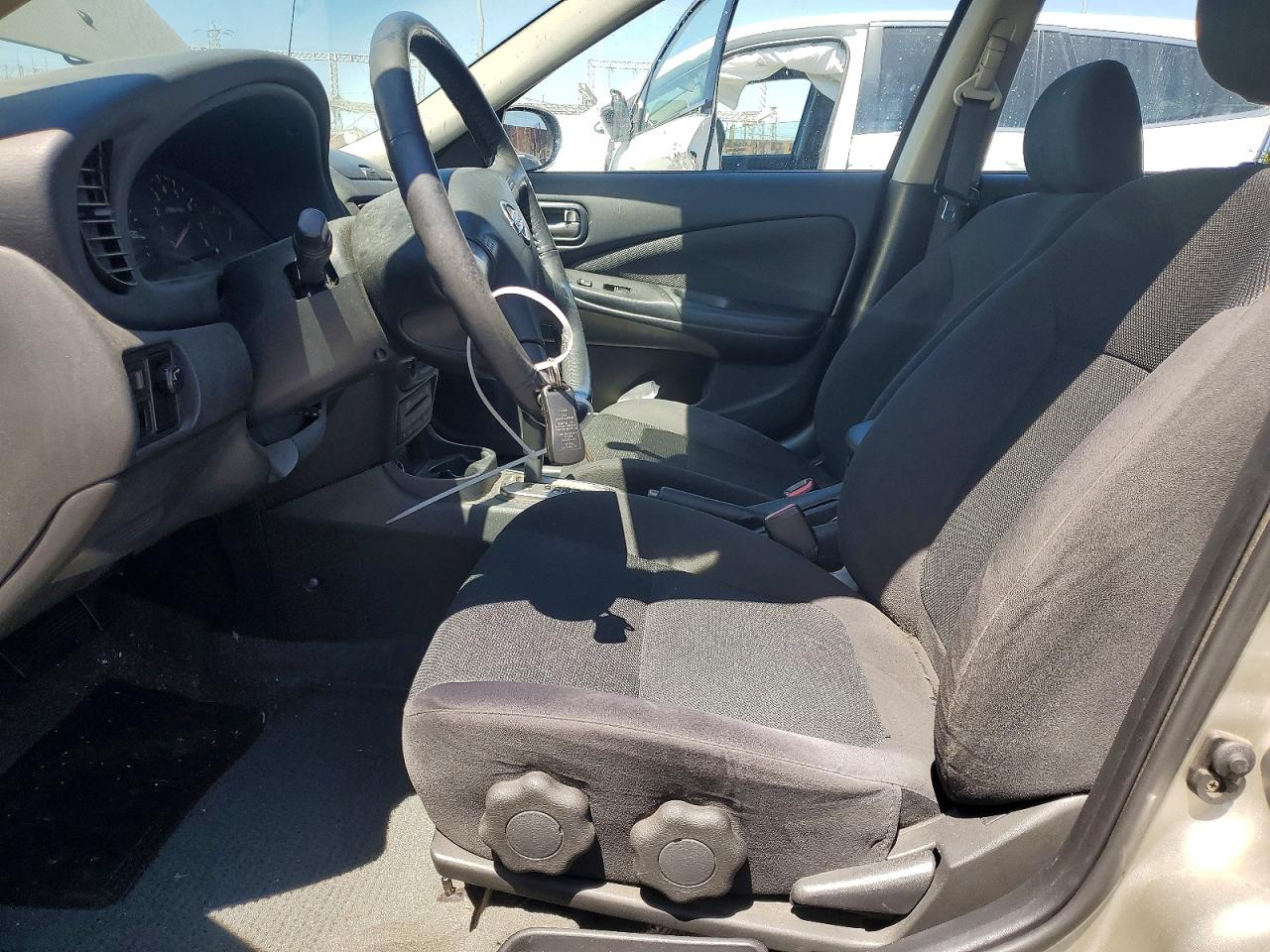 2006 Nissan Sentra 1.8 Tan vin: 3N1CB51D26L465979