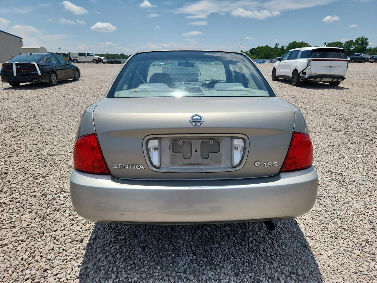 2006 Nissan Sentra 1.8 Tan vin: 3N1CB51D36L497131