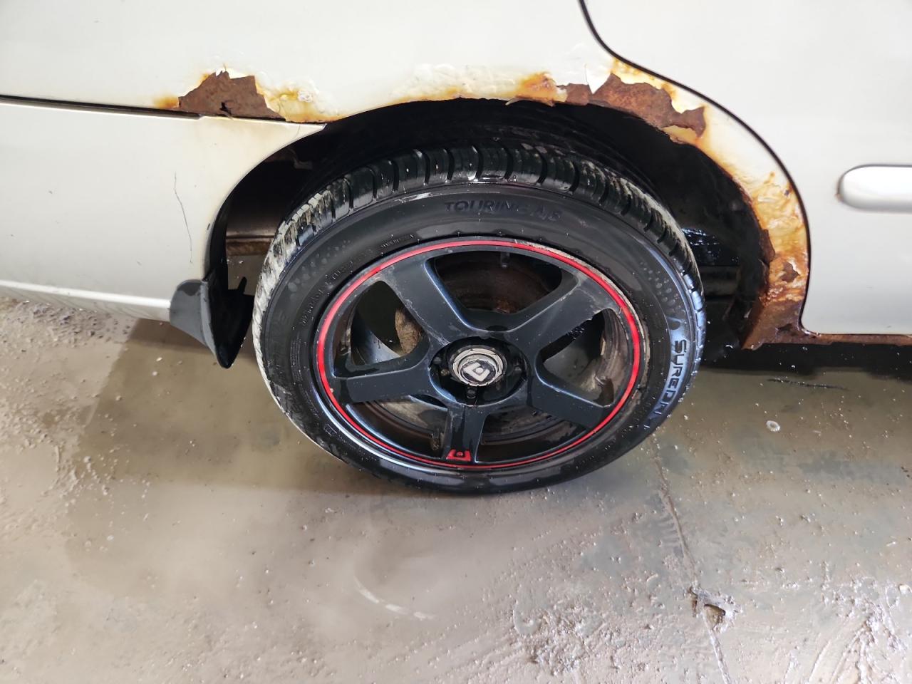2006 Nissan Sentra 1.8 Silver vin: 3N1CB51D36L623293 Damage: Right Rear Wheel, Aftermarket, Acceptable