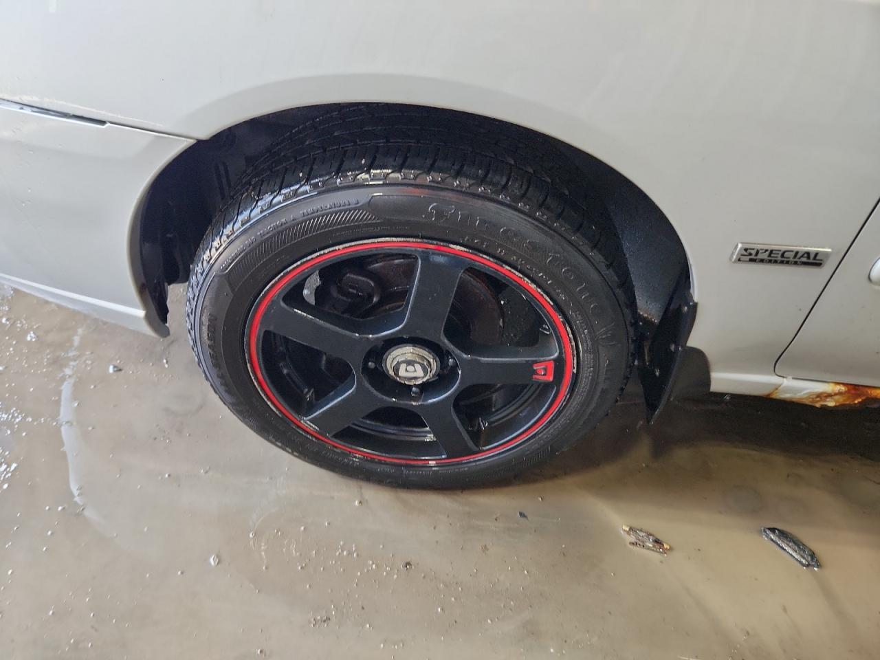 2006 Nissan Sentra 1.8 Silver vin: 3N1CB51D36L623293 Damage: Left Front Wheel, Aftermarket, Acceptable