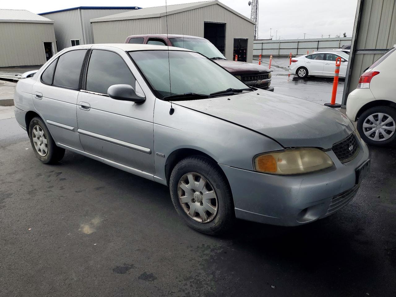 2002 Nissan Sentra Xe Серебряный vin: 3N1CB51D42L624933