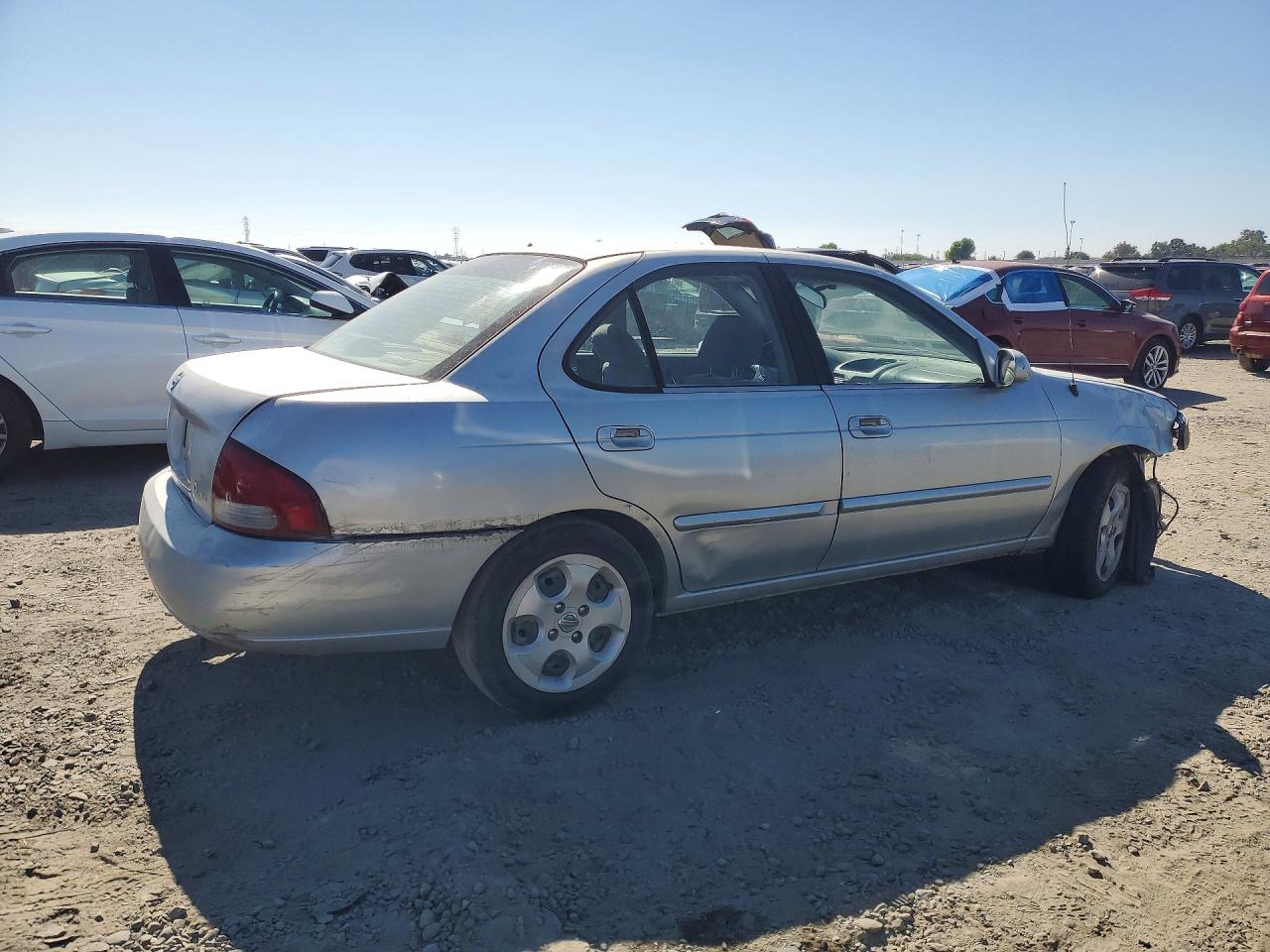 2003 Nissan Sentra Xe Серебряный vin: 3N1CB51D43L792301