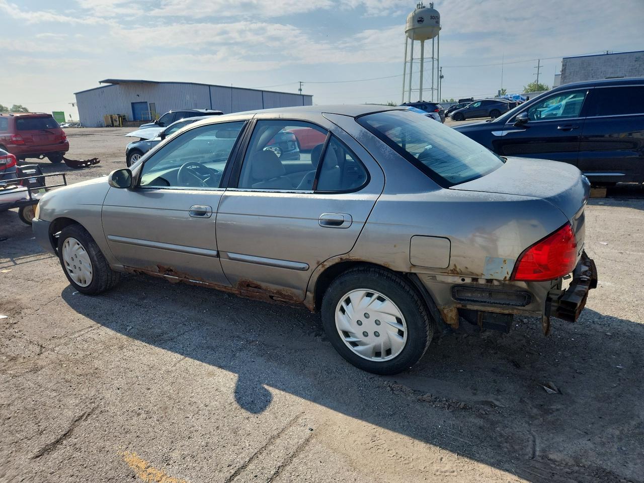 2004 Nissan Sentra 1.8 Tan vin: 3N1CB51D44L847363