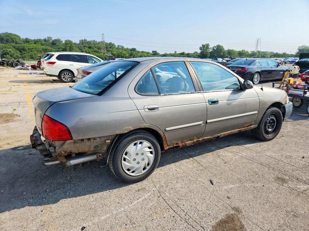 2004 Nissan Sentra 1.8 Tan vin: 3N1CB51D44L847363