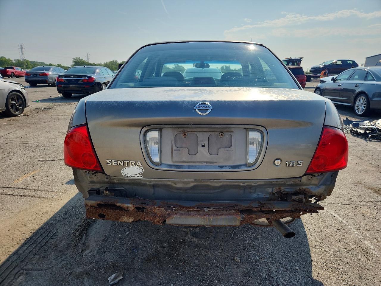 2004 Nissan Sentra 1.8 Tan vin: 3N1CB51D44L847363