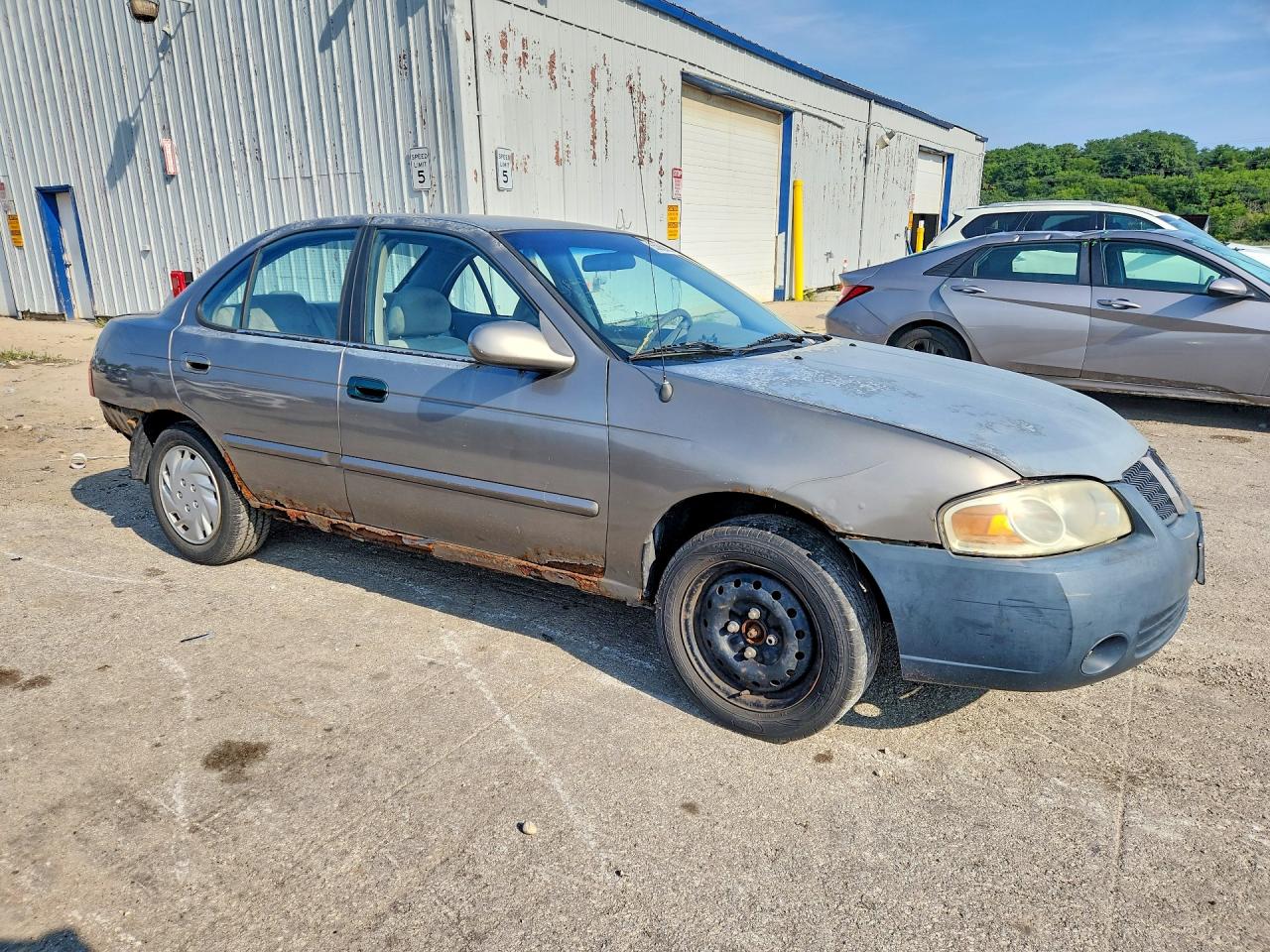 2004 Nissan Sentra 1.8 Tan vin: 3N1CB51D44L847363
