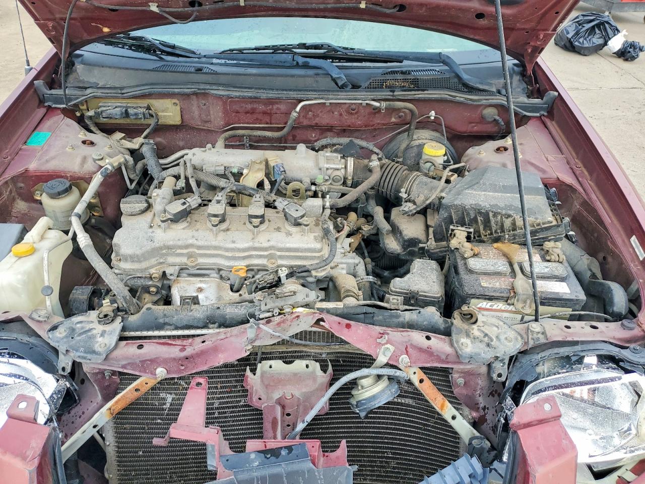 2004 Nissan Sentra 1.8 Burgundy vin: 3N1CB51D44L897843