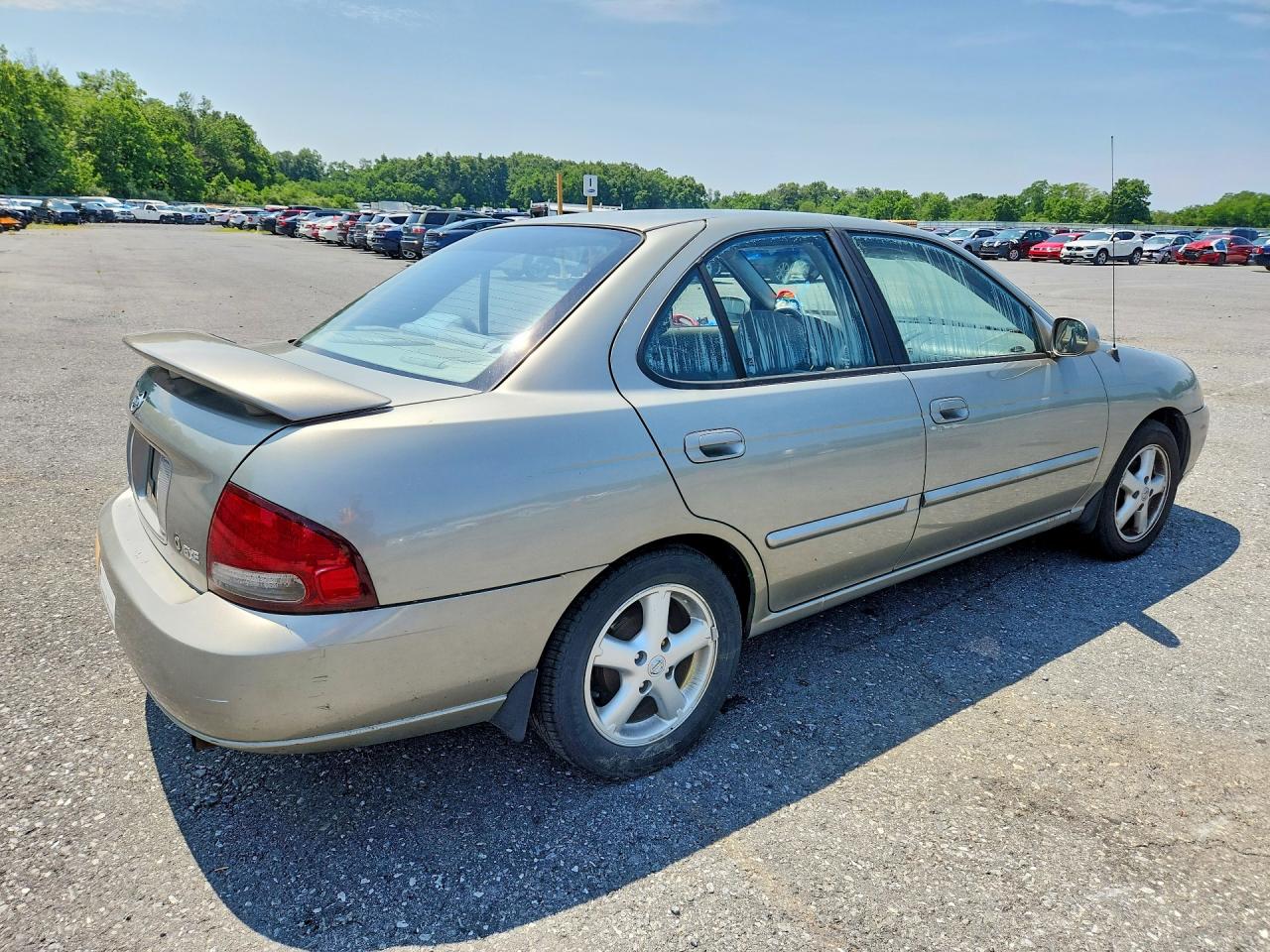 2002 Nissan Sentra Xe Tan vin: 3N1CB51D62L648747