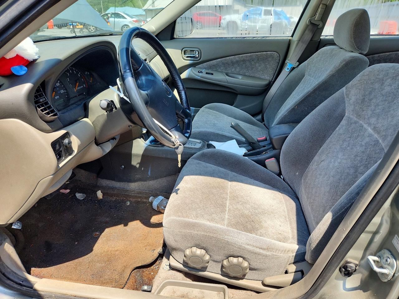 2002 Nissan Sentra Xe Tan vin: 3N1CB51D62L648747