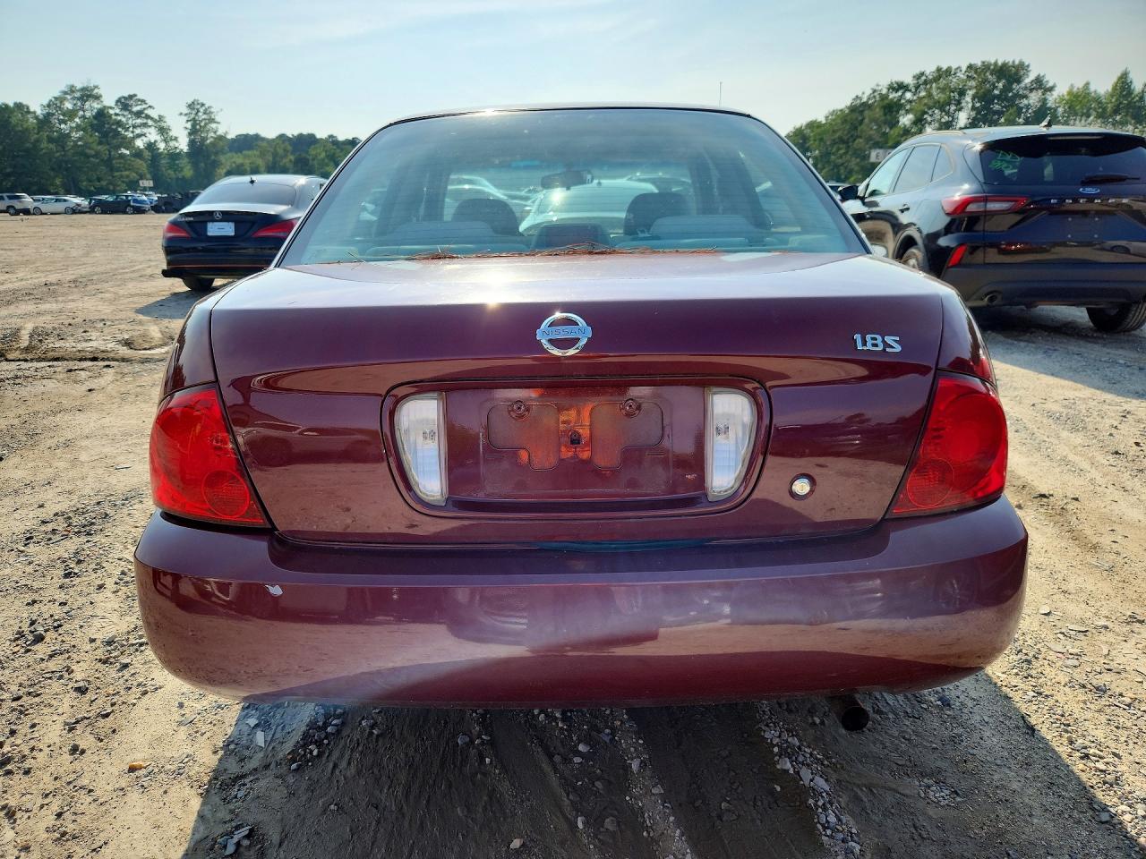 2004 Nissan Sentra 1.8 Burgundy vin: 3N1CB51D74L822540