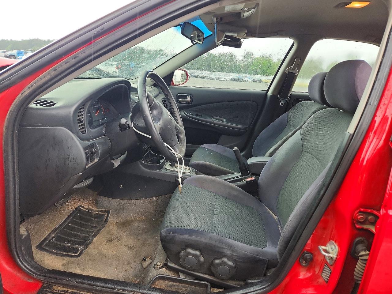 2006 Nissan Sentra 1.8 Red vin: 3N1CB51D76L542104