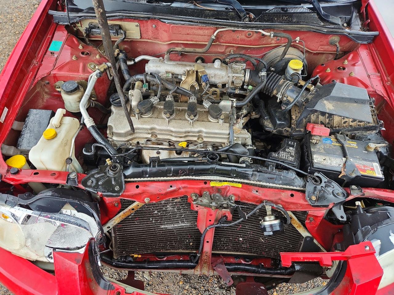2006 Nissan Sentra 1.8 Red vin: 3N1CB51D76L542104