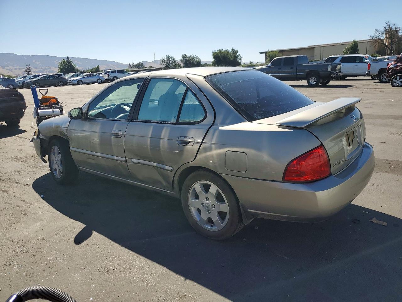 2005 Nissan Sentra 1.8 Желто-коричневый vin: 3N1CB51DX5L541561