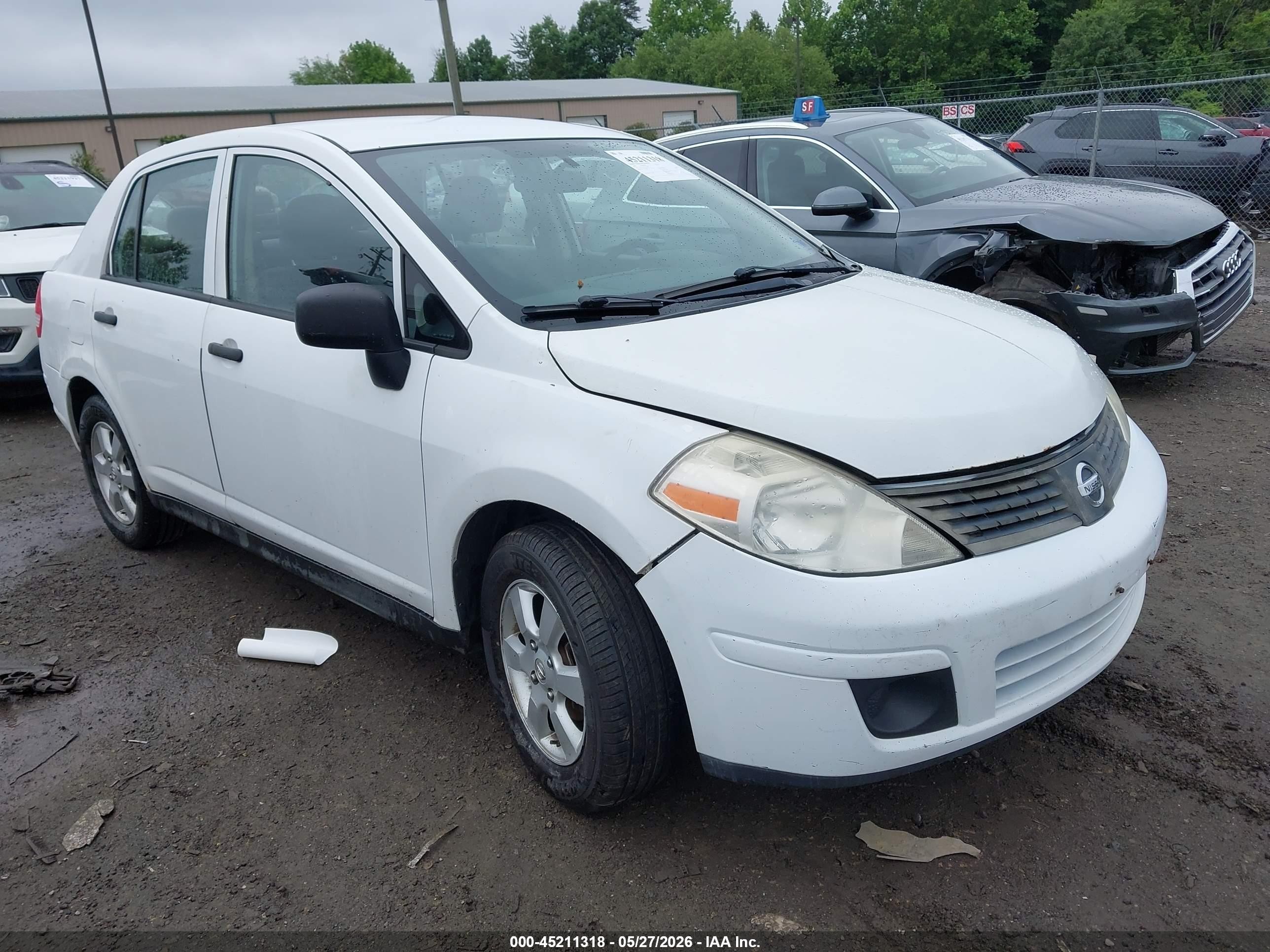 2009 Nissan Versa 1.6 Base White vin: 3N1CC11E59L458401