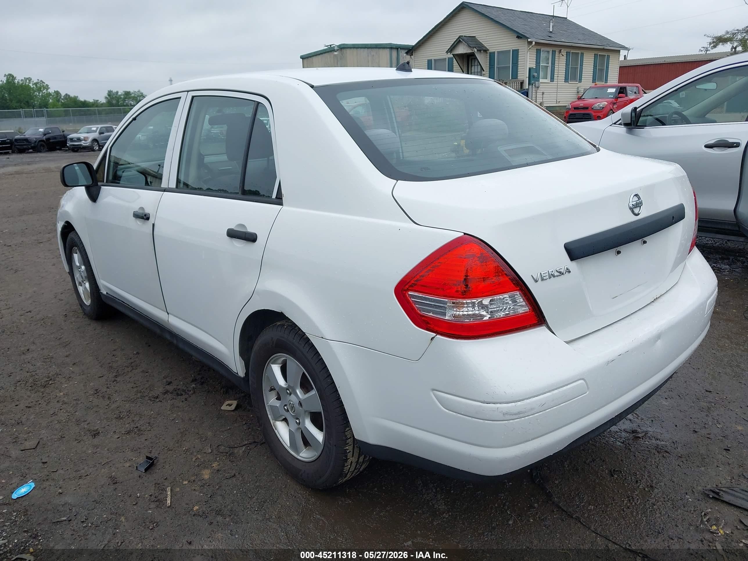 2009 Nissan Versa 1.6 Base White vin: 3N1CC11E59L458401