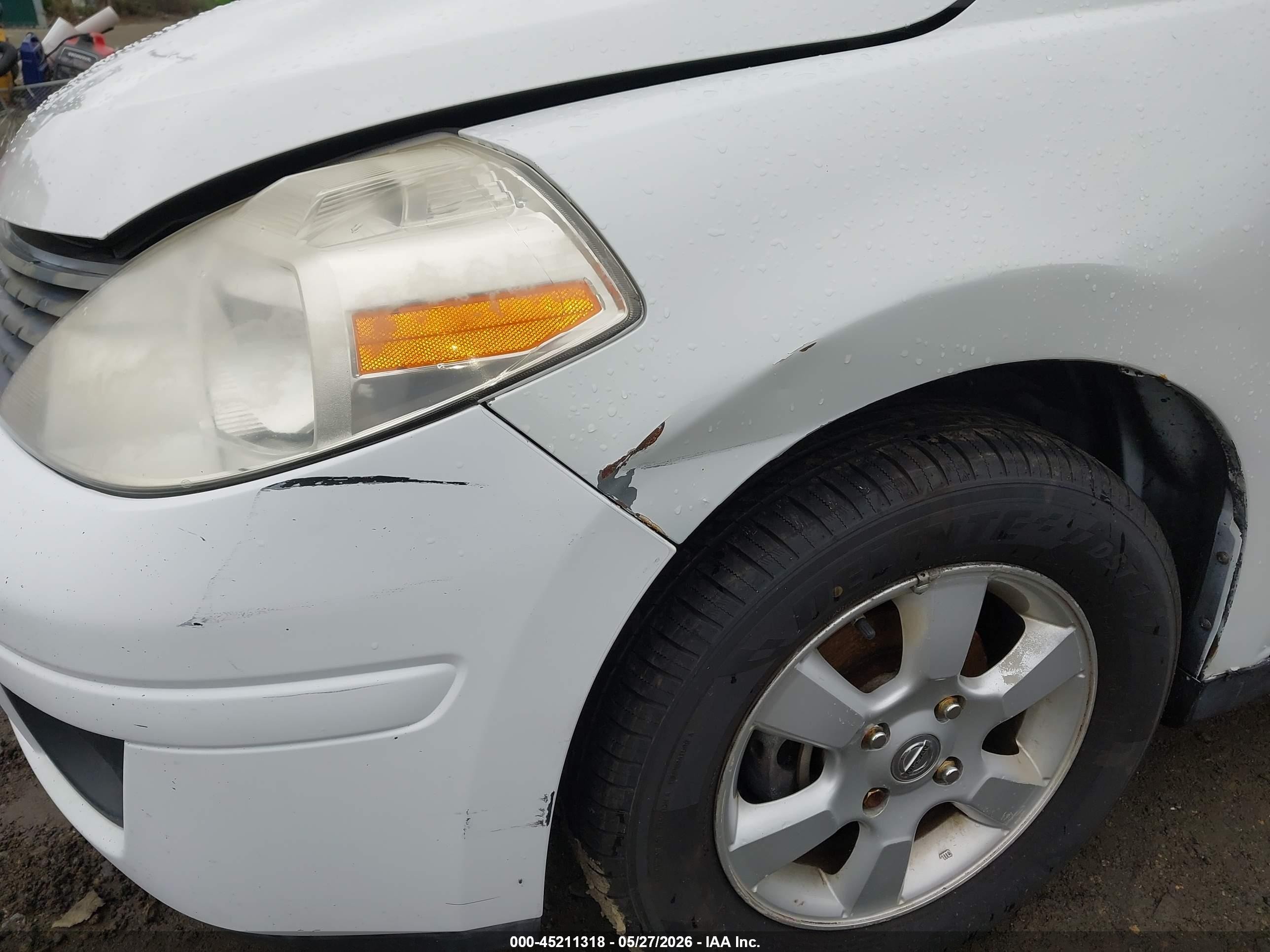 2009 Nissan Versa 1.6 Base White vin: 3N1CC11E59L458401