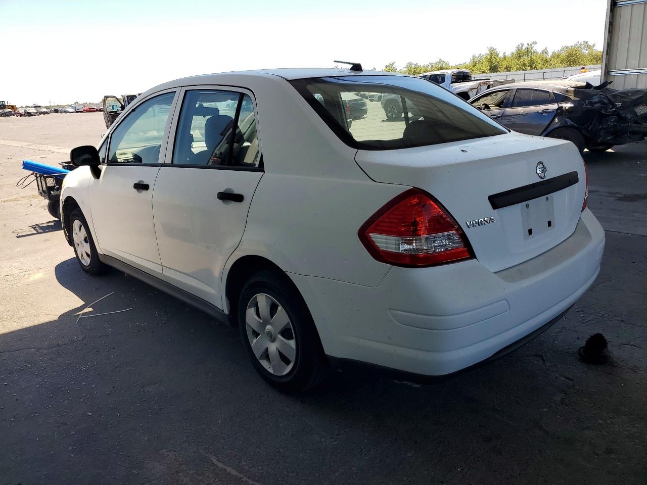 2009 Nissan Versa 1.6 Base White vin: 3N1CC11E99L436627